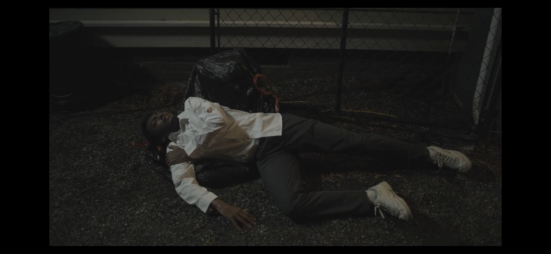 Trash bag and tattered shirt props