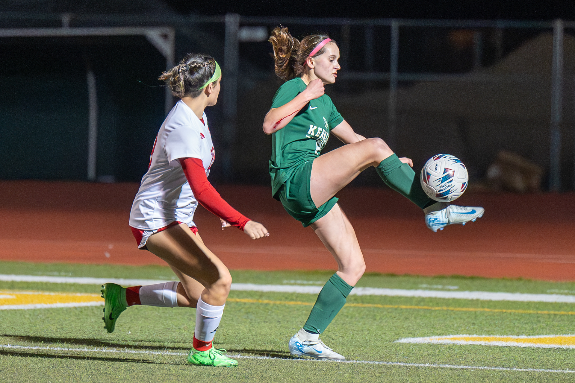 McClatchy versus Kennedy girls soccer. The artificial turf skinned the Kennedy player. Photo by Duv Cardenas in Sacramento, CA