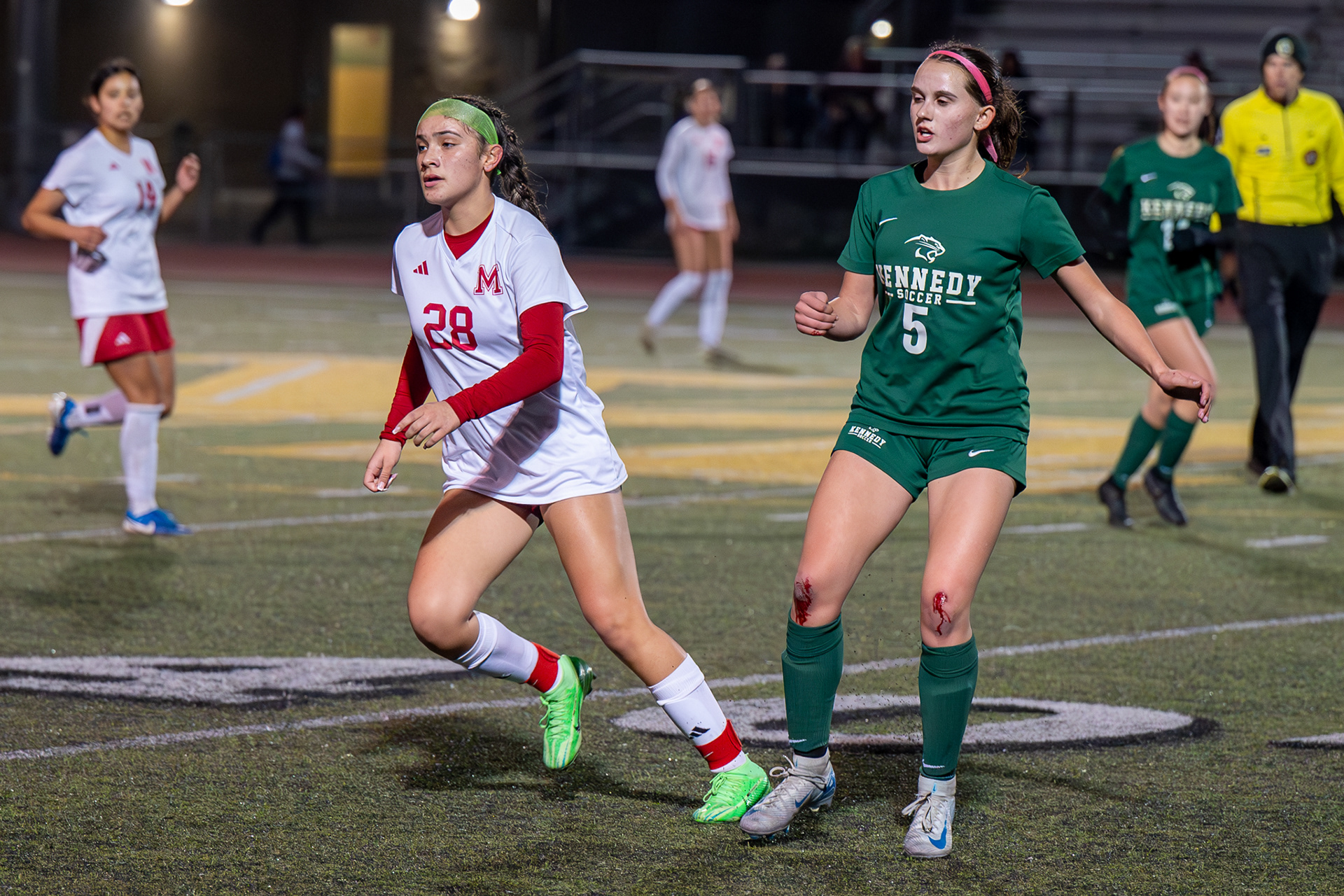 McClatchy versus Kennedy girls soccer. The artificial turf skinned the Kennedy player. Photo by Duv Cardenas in Sacramento, CA