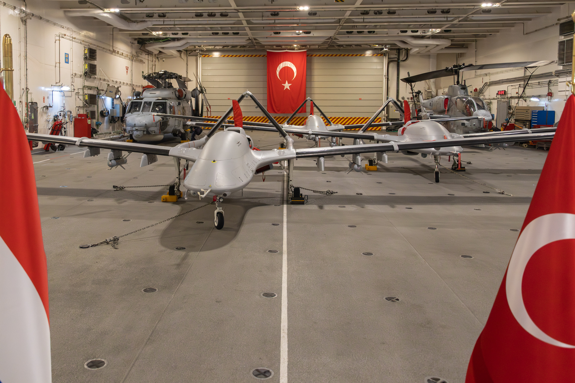 Bayraktar, Sea Hawk helicopter and Cobra helicopter at TCG Anadolu