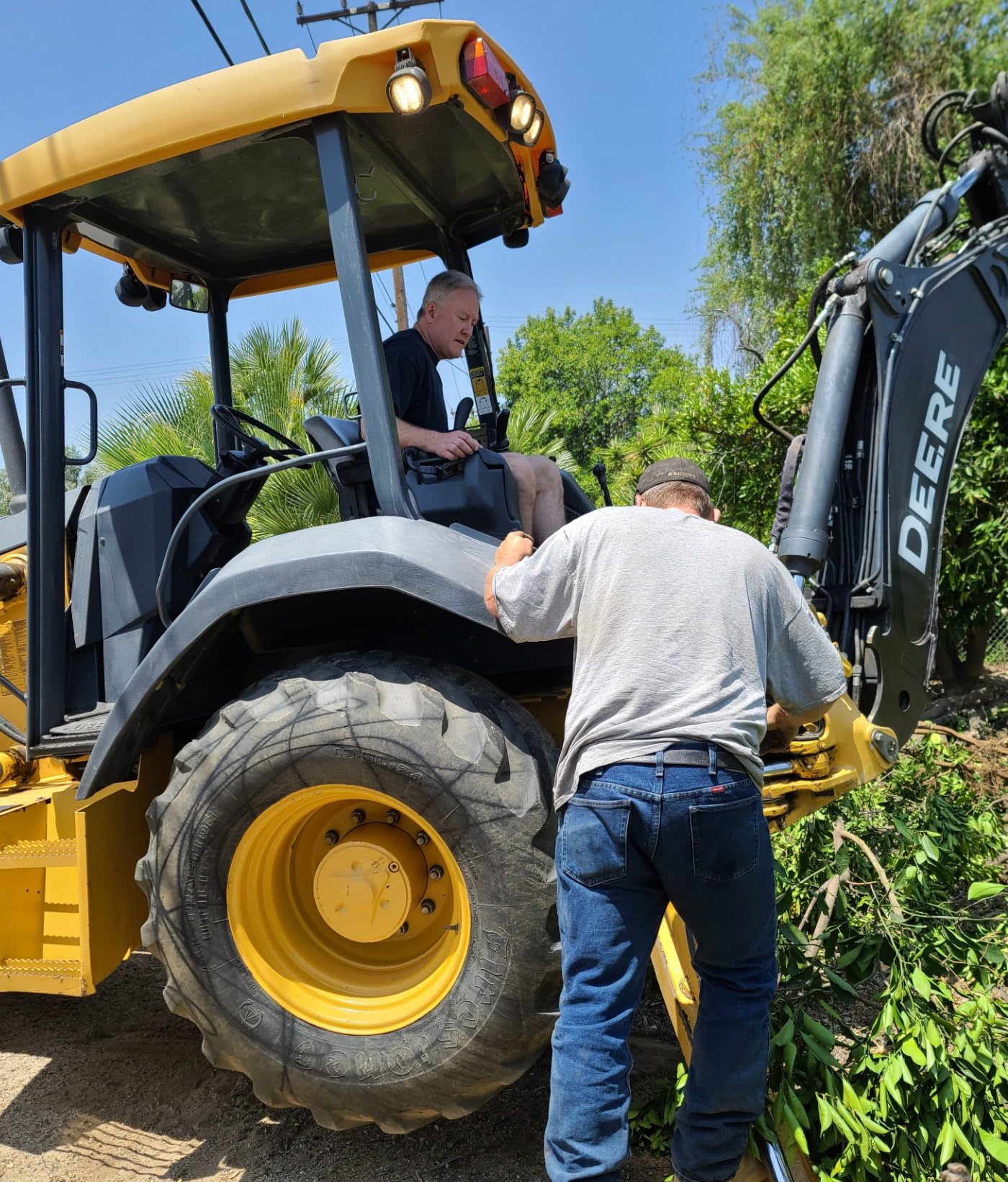 Me running the backhoe. Poorly.