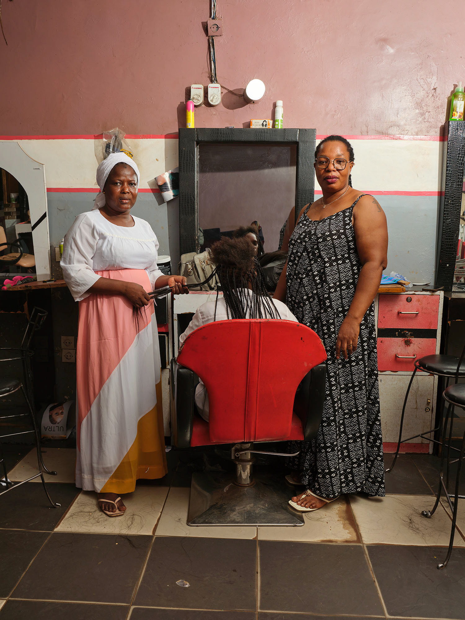 Elisabeta and Aminata work at the Baron Center beauty salon. Bamako, May 2025