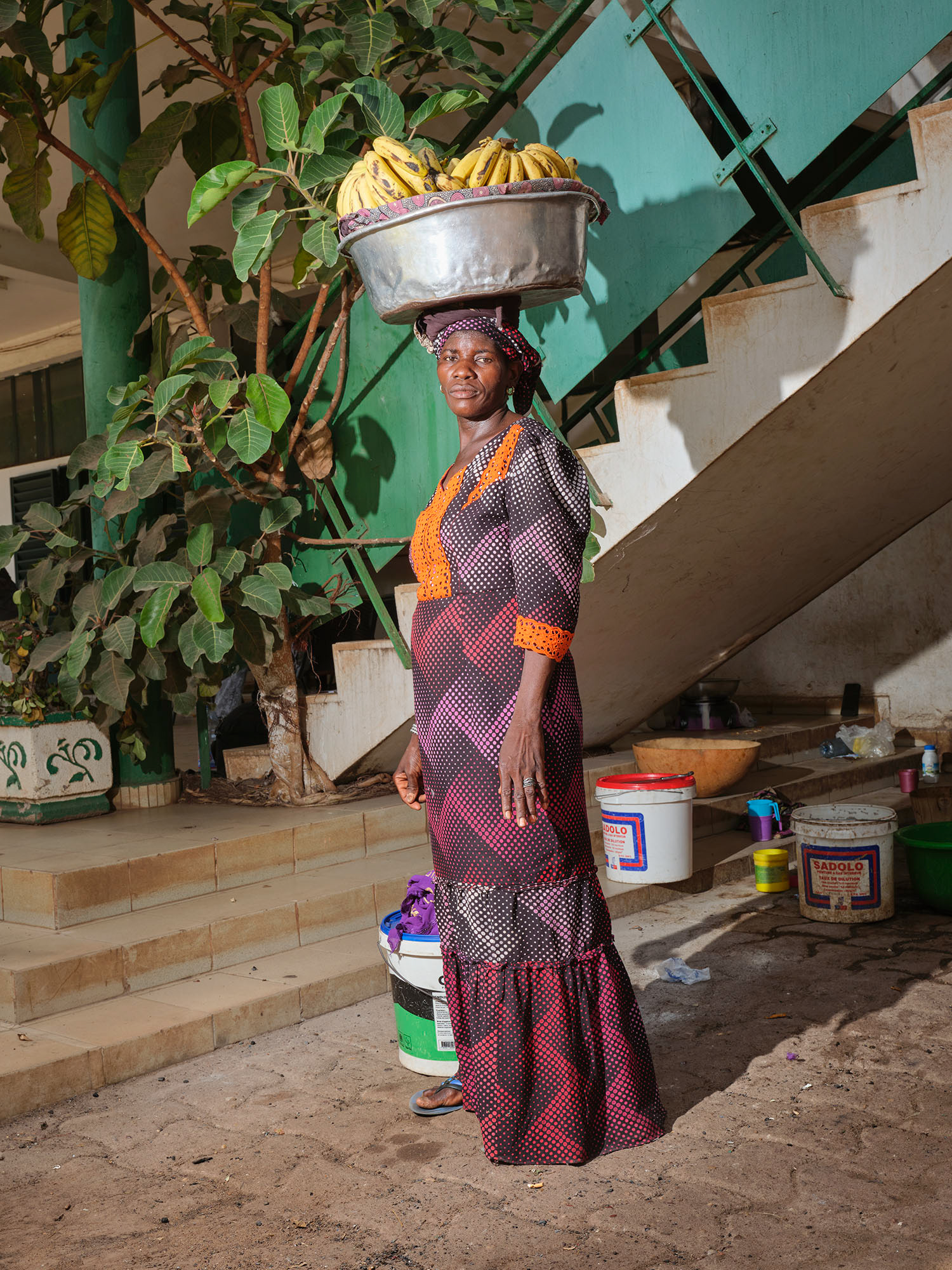 Fatima Perou sells bunches of bananas on the streets of Bamako. May 2025