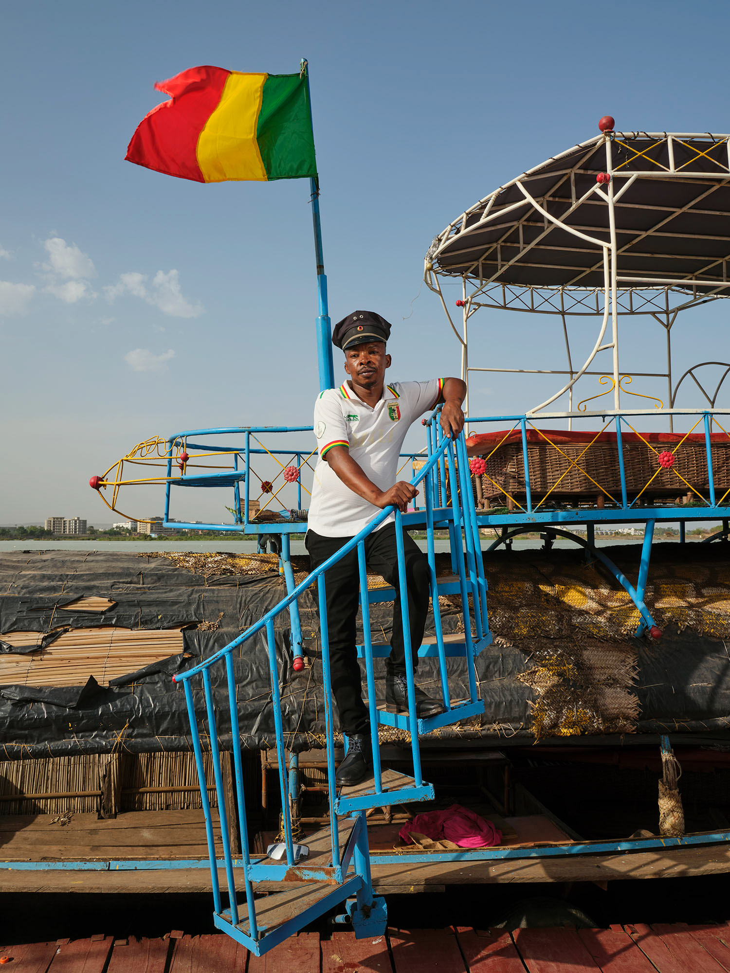 Badadere Daouda, captain of a pirogue on the Niger River, where he organizes sunset tours for groups. Bamako, May 2025