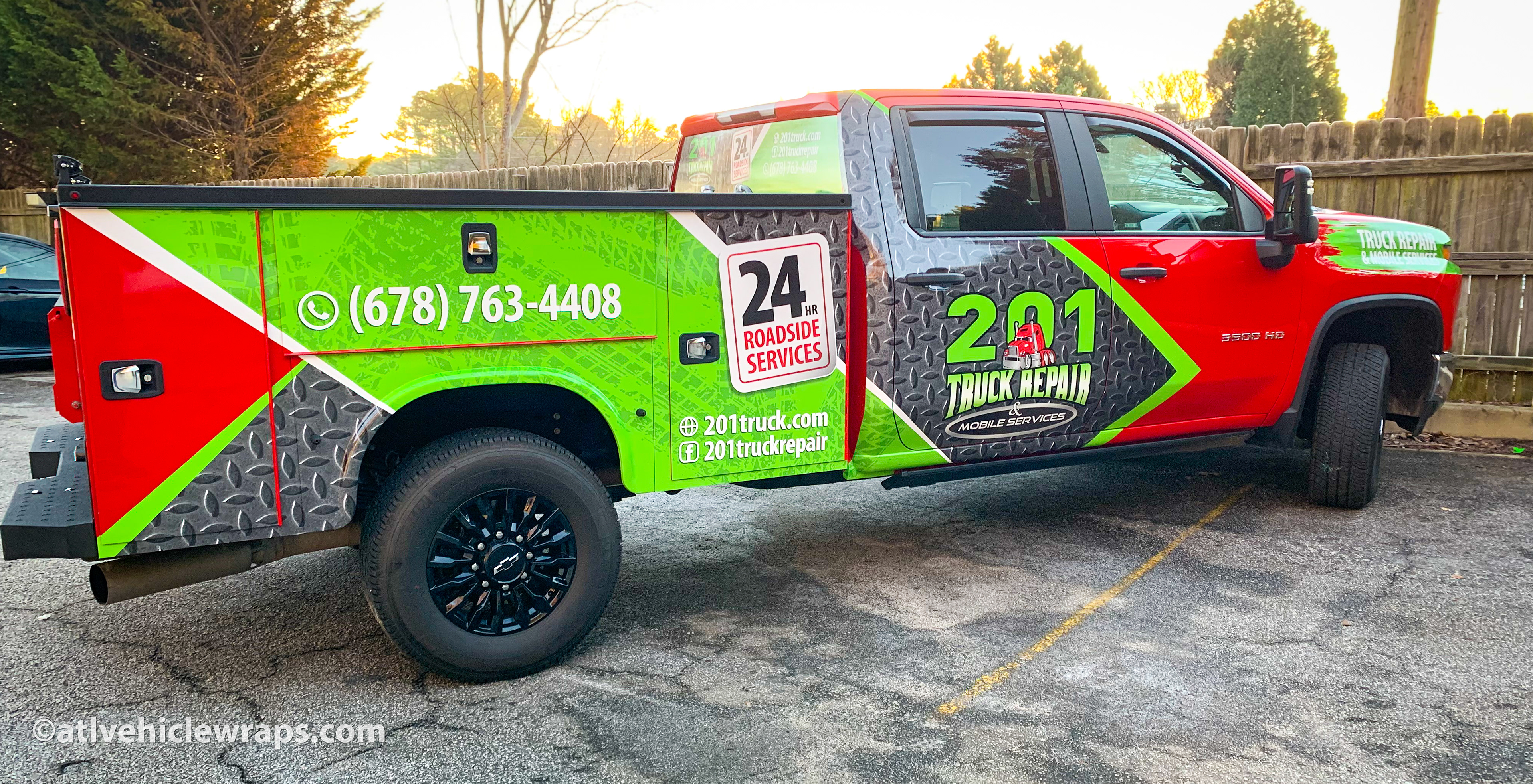 Hero image: Custom partial vehicle wrap on a Chevrolet 3500 HD for a repair service in the Atlanta area.