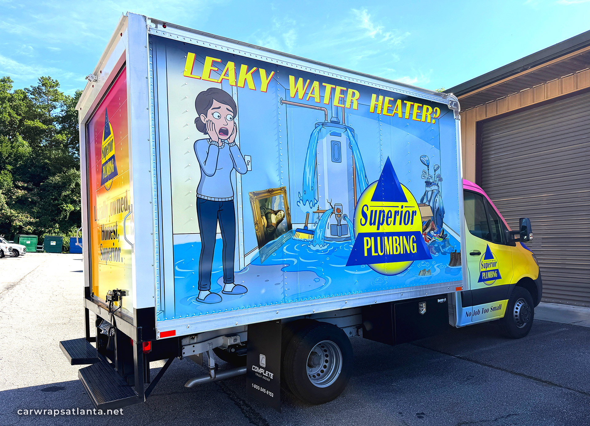 ATL Vehicle Wraps commercial van wrap on a Mercedes-Benz Sprinter featuring blue and black fleet graphics, business branding, and Atlanta skyline background.