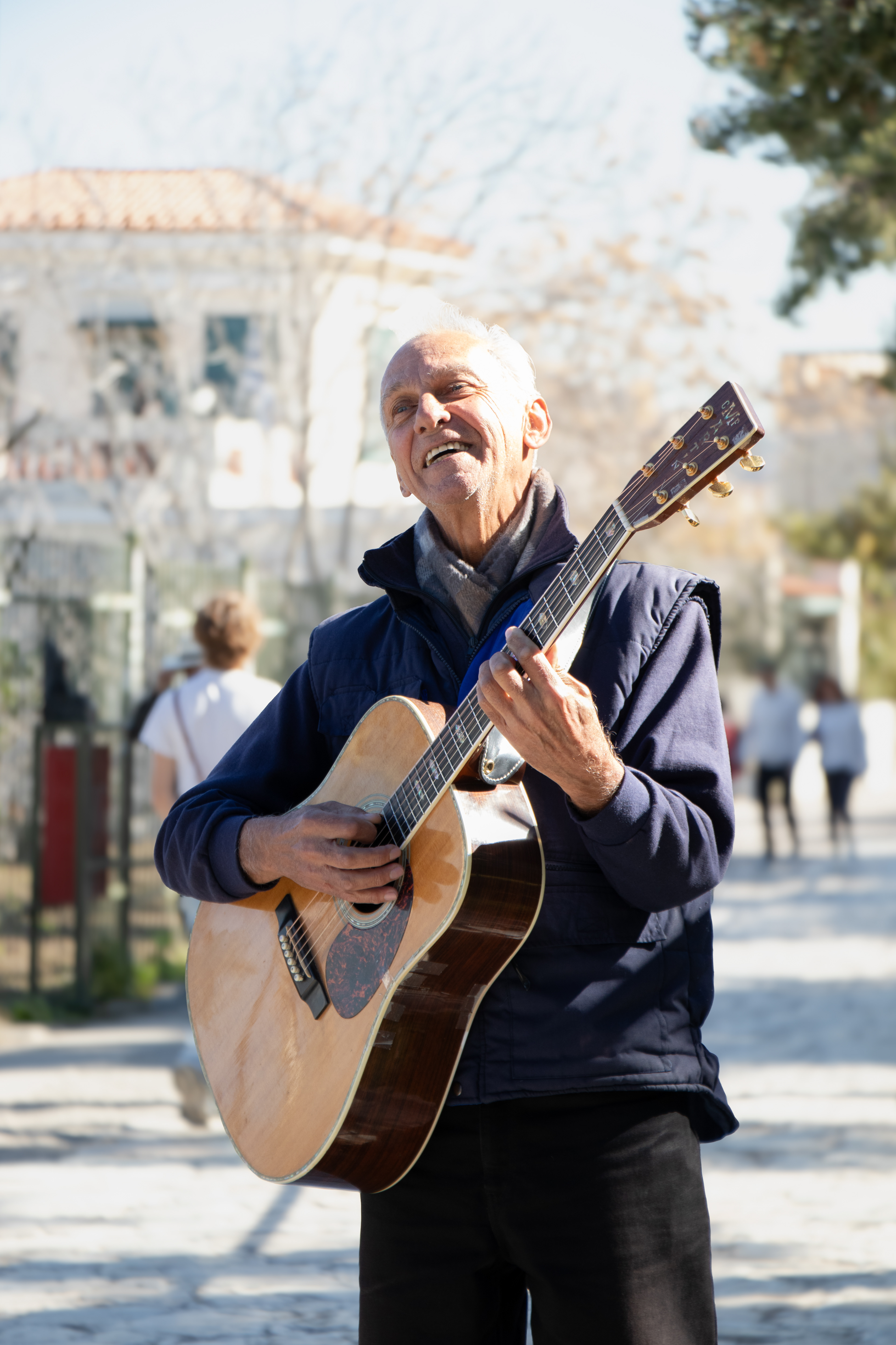 A street musician in Athens, filling the streets with guitar melodies. March 8, 2025