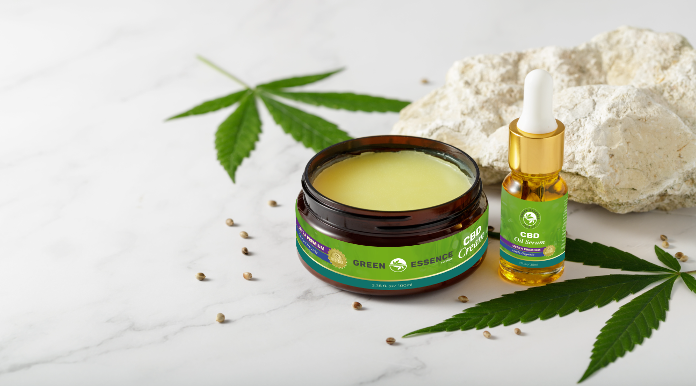 CBD cannabis products cream and oil serum in nice packaging with graphic design labels