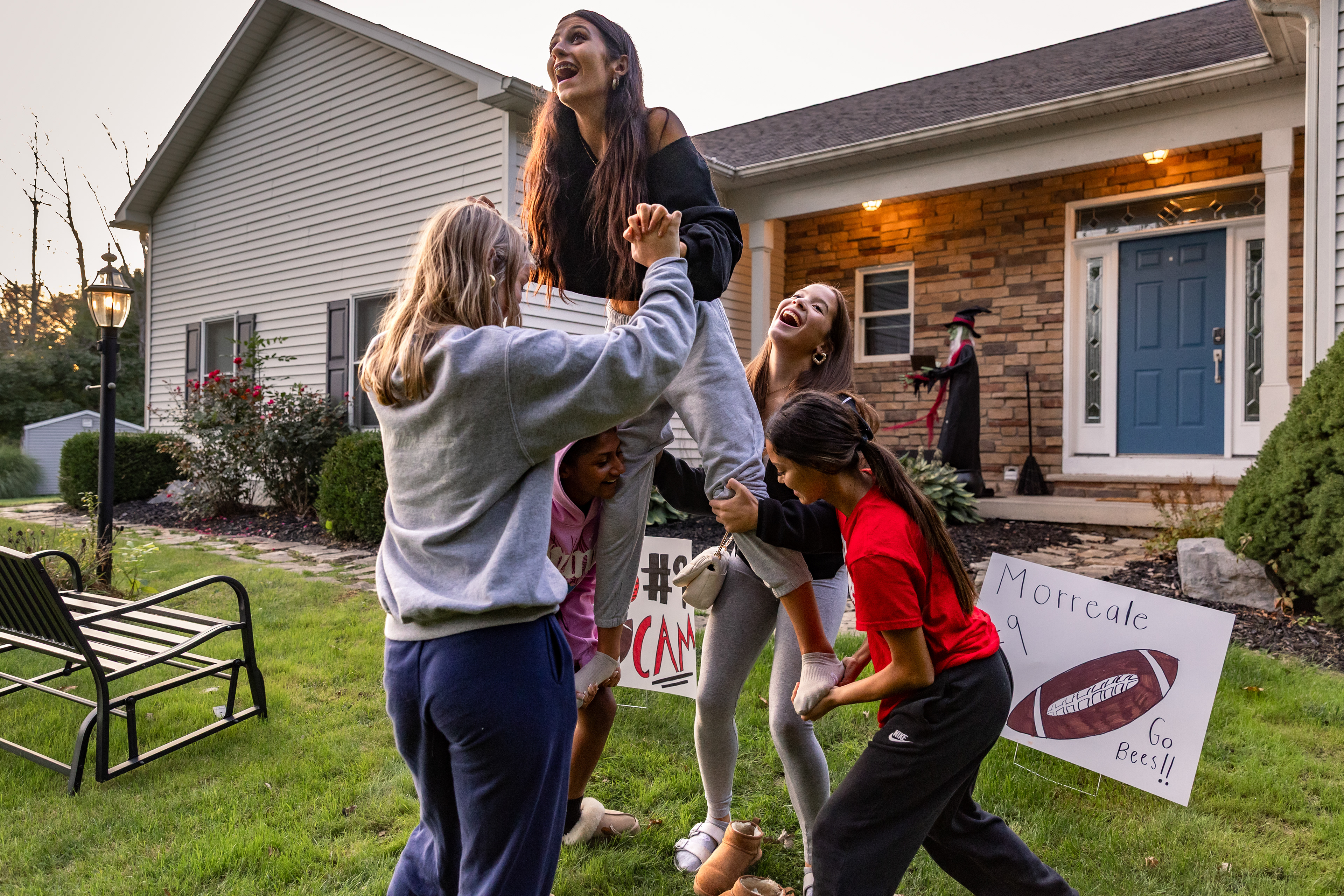 Abbey hangs out with her teammates and friends. Due to the impact of her cardiac arrest at cheer camp, the entire team has become a support system for her, often assisting her throughout the day at school and checking in on her well-being.