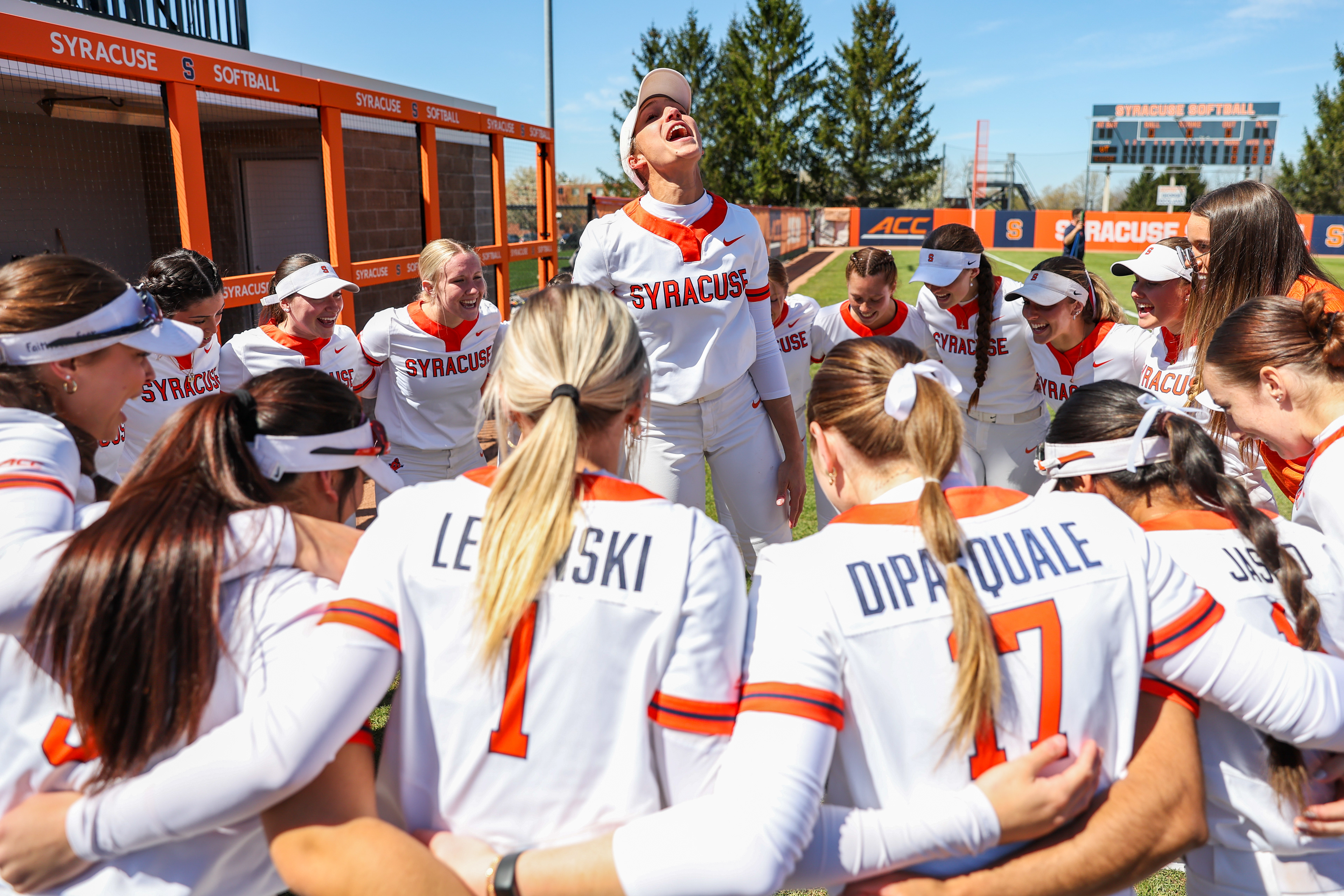 Syracuse's Rebecca Clyde leads teammates in a chant before a college softball game against Virginia Tech in Syracuse, N.Y., on April 26, 2024.