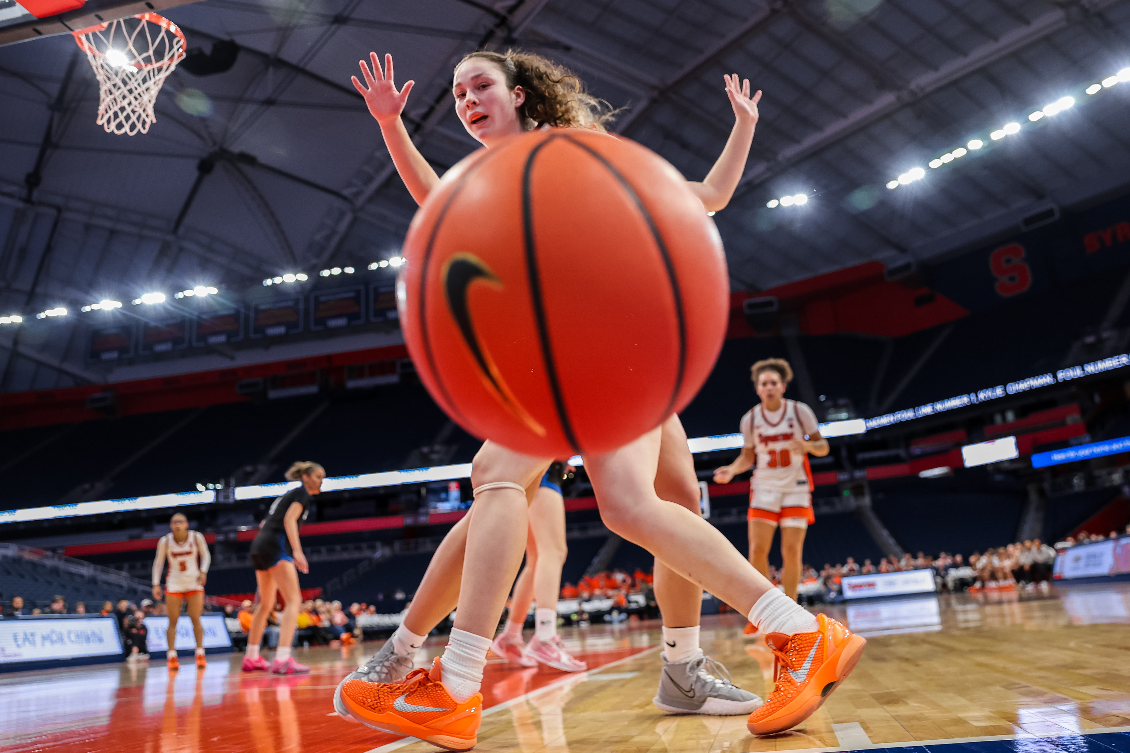 Syracuse guard Sophie Burrows (4) watches as the ball goes out of bounds after a Daemen player knocked it away during an exhibition game on Oct. 28, 2025, in Syracuse, N.Y.
