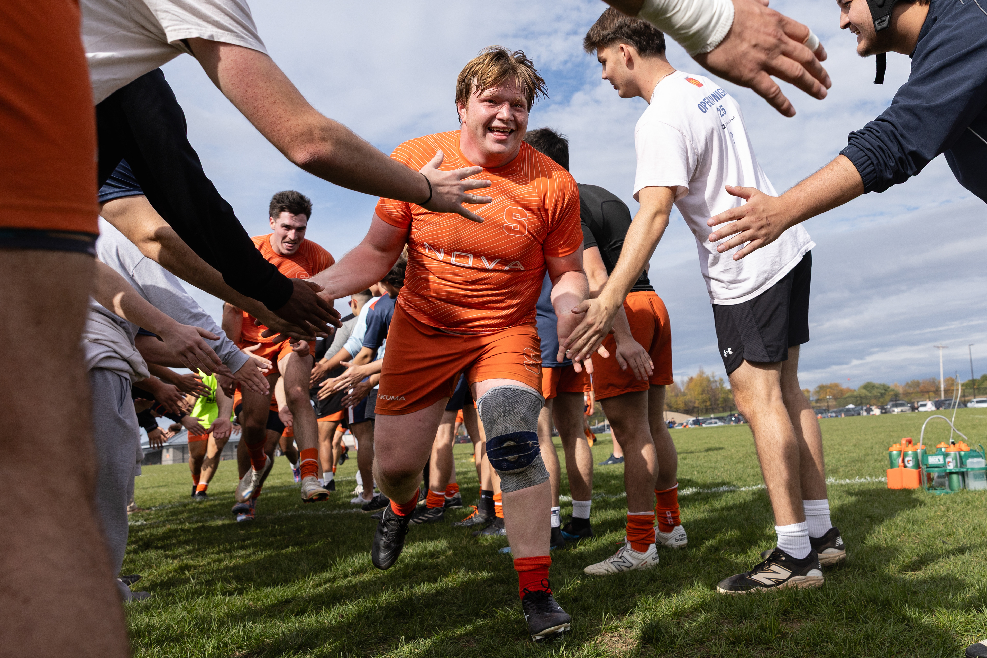 After a commanding victory against Harvard, Patrick runs through a tunnel of teammates to celebrate on Oct. 18, 2025. Despite his progress forward, the path remains uncertain for Patrick. With limited funding, shrinking professional opportunities, and little transparency about the draft, players are often left to navigate their futures on their own.  As the 2026 Major League Rugby Draft approaches, Patrick continues to train hard, chasing a future that, for now, has no clear path but that he hopes he is starting to build.   