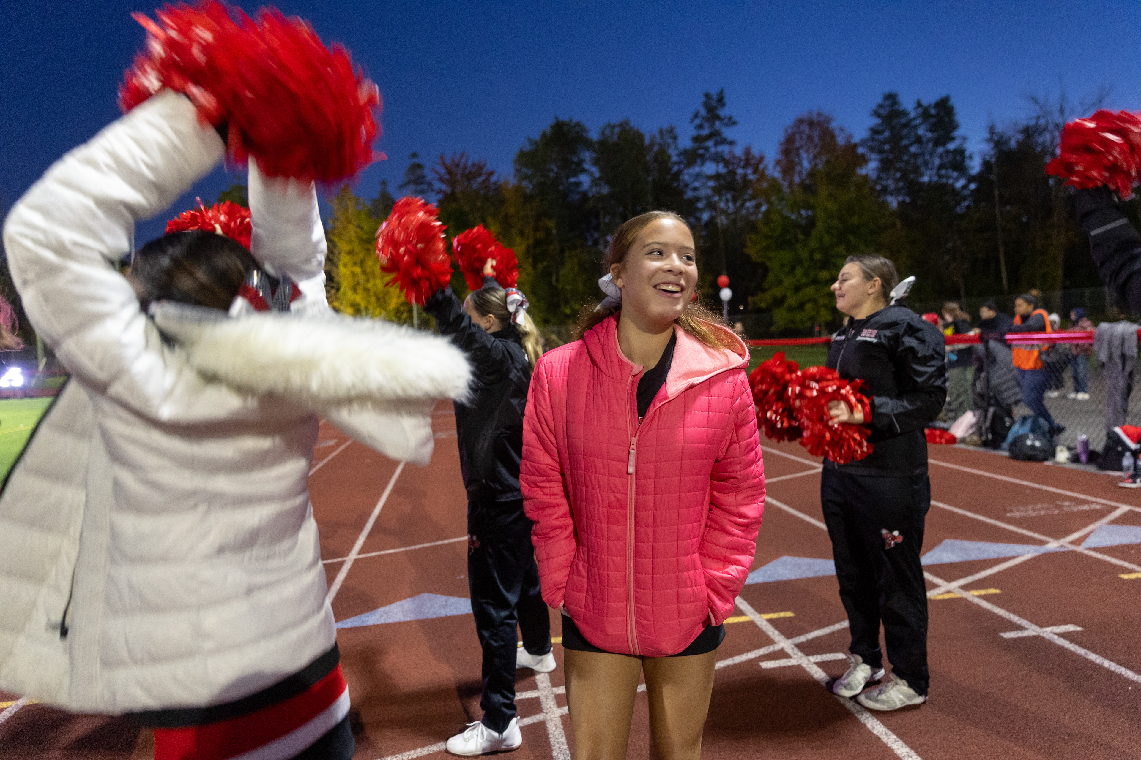 Unable to participate in routines with the rest of the team, Abbey still makes sure she cheers for every point their football team scores and supports the team by attending every event, fixing the other girl’s hair, and yelling out the chants from the side.