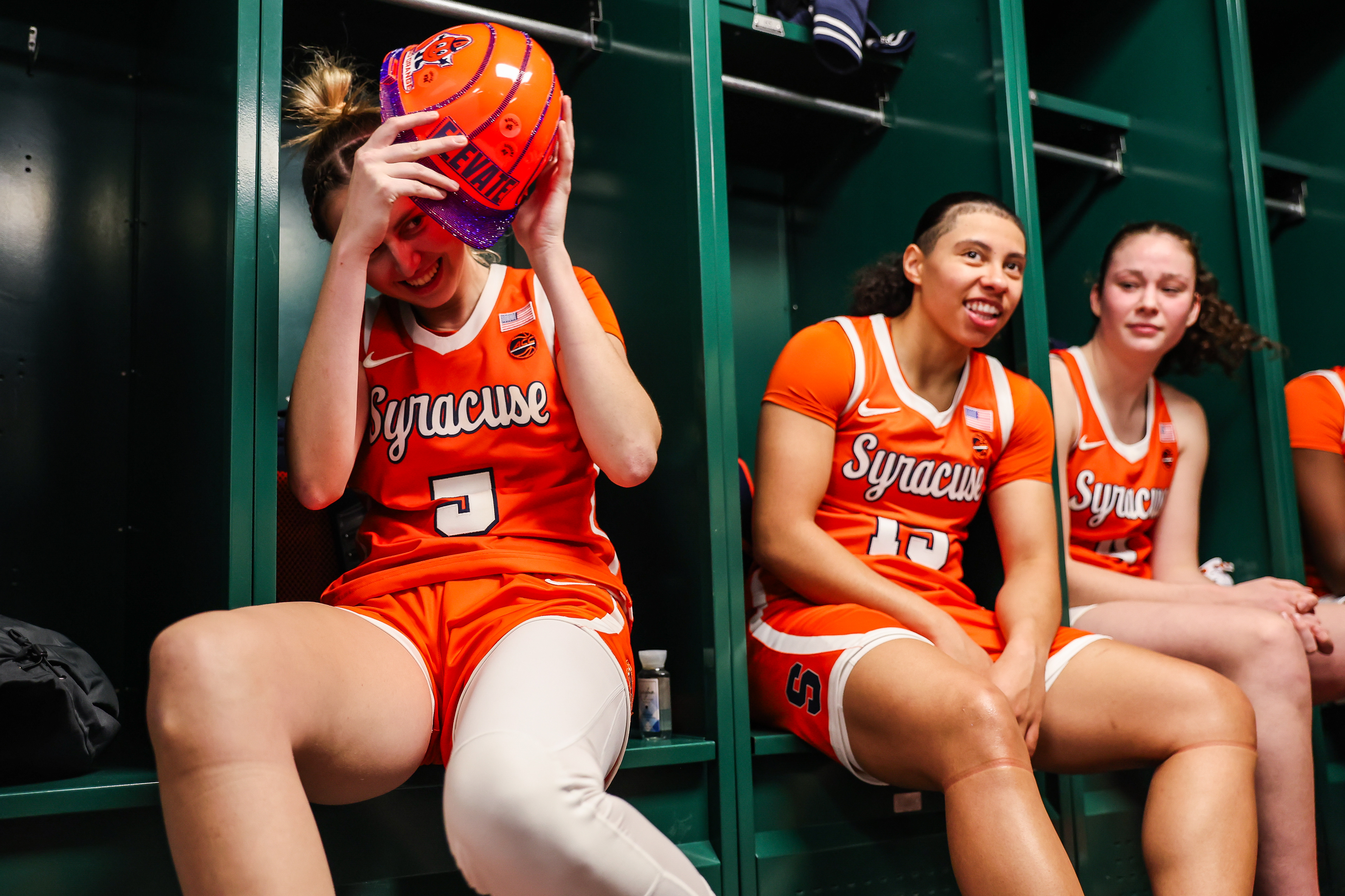 Syracuse guard Georgia Woolley receives the team's "Hard Hat" award after the Orange defeated Binghamton in a college basketball game on Dec. 18, 2024, in Binghamton, N.Y.