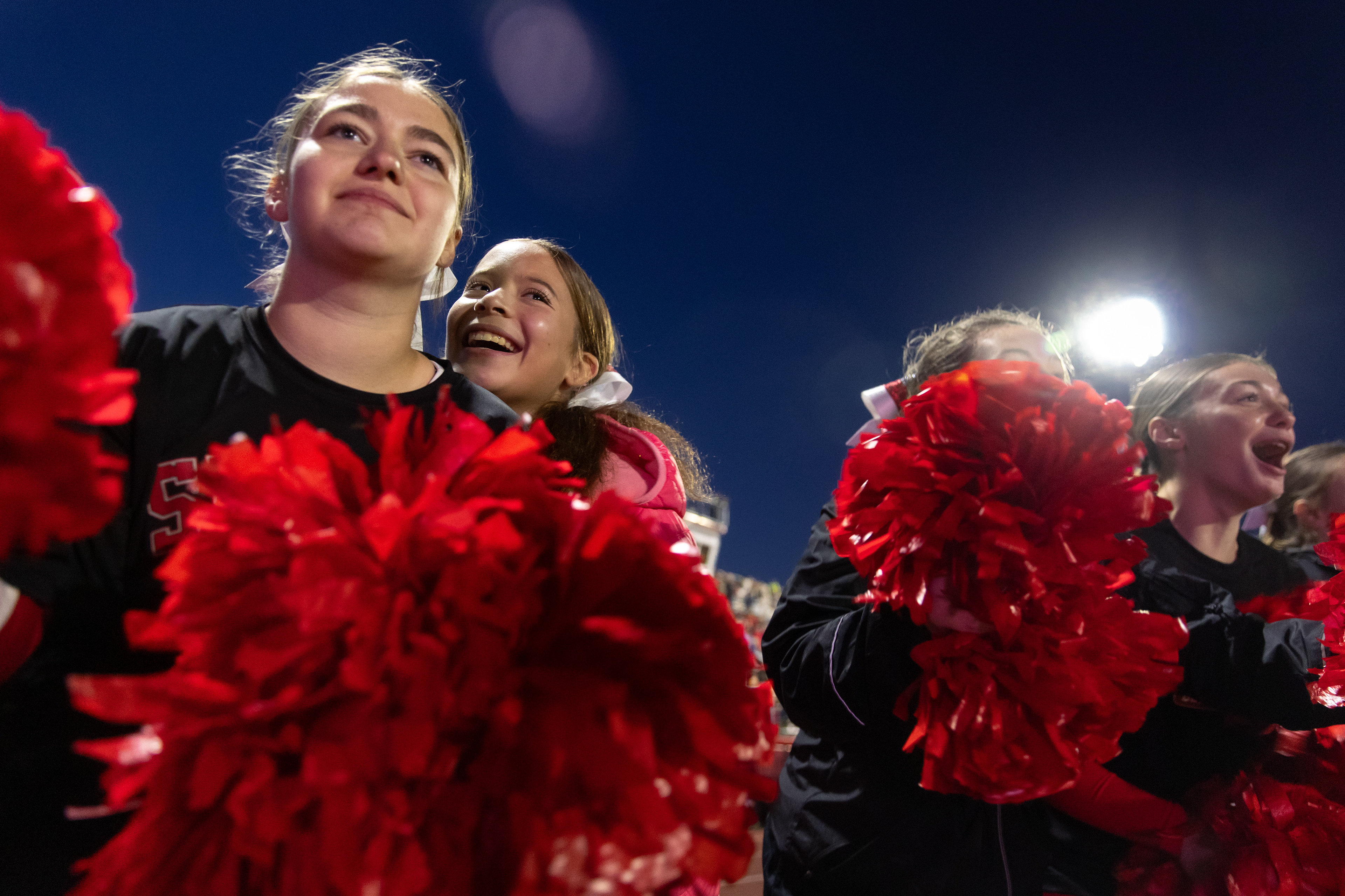 Abbey and the squad cheer on the football teams’ attempt to score a point after their touchdown at the senior night game. Coach Cassidy Christensen, the cheer coach, has said that Abbey is a bright light that can’t be dulled and her energy radiates throughout any room she steps into.