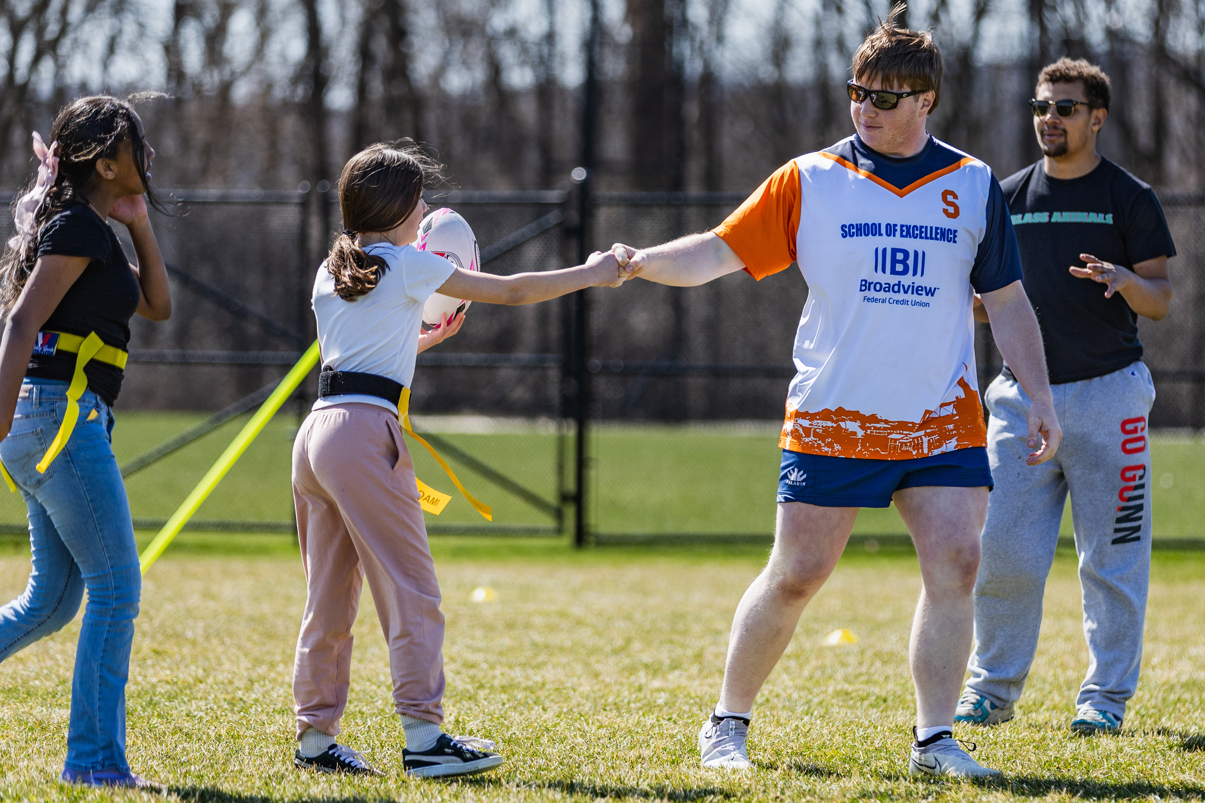 Through youth clinics and Leinster School of Excellence Camps, Patrick has embraced a mentorship role, driven by a desire to give back to a sport that reshaped his own path. On April 9, 2026, the team hosted its first inter-school flag rugby festival, introducing more than 120 Syracuse students to the sport. “It’s so easy for me to support all the events we do because of how I was raised. I enjoy giving back to others, and I think seeing the smile on their faces makes it all worth it… It’s so much fun to just work with others and make the community a better place, and I have met so many fantastic people in my time.”