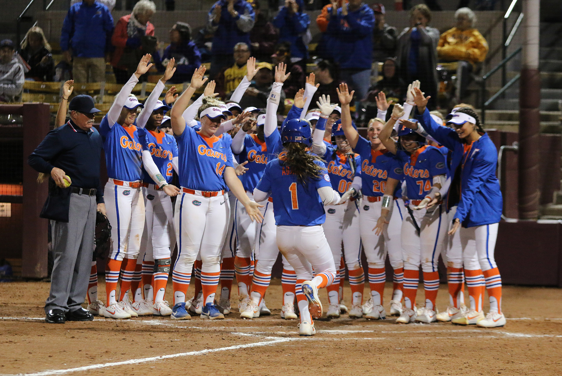 Florida softball players celebrate a home run during a game against Arizona State on Feb. 15, 2019 at Farrington Stadium in Tempe, Ariz.