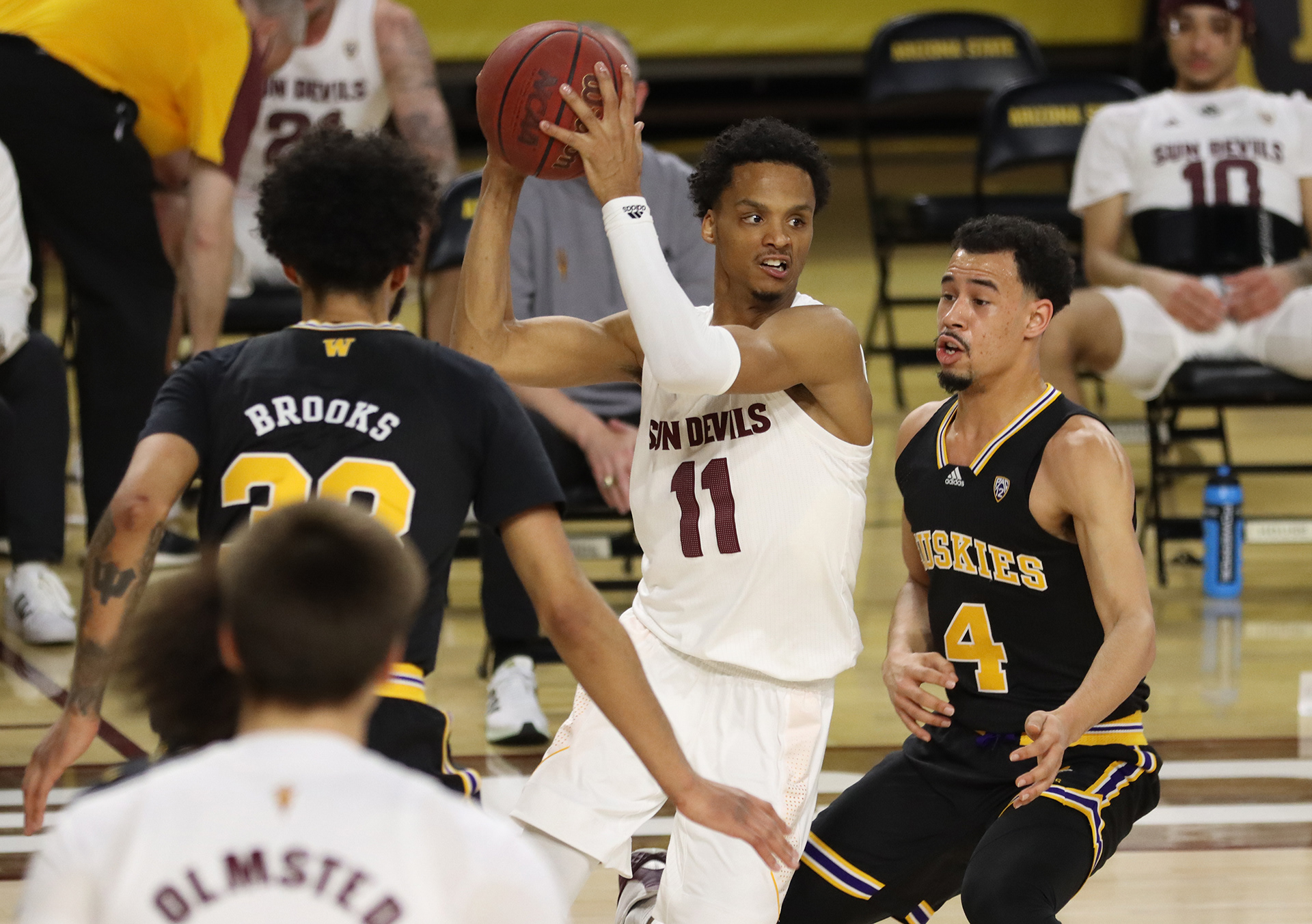 Arizona State guard Alonzo Verge Jr. (11) gets surrounded by Washington defenders during a game on Feb. 23, 2021, at Desert Financial Arena in Tempe, Ariz.