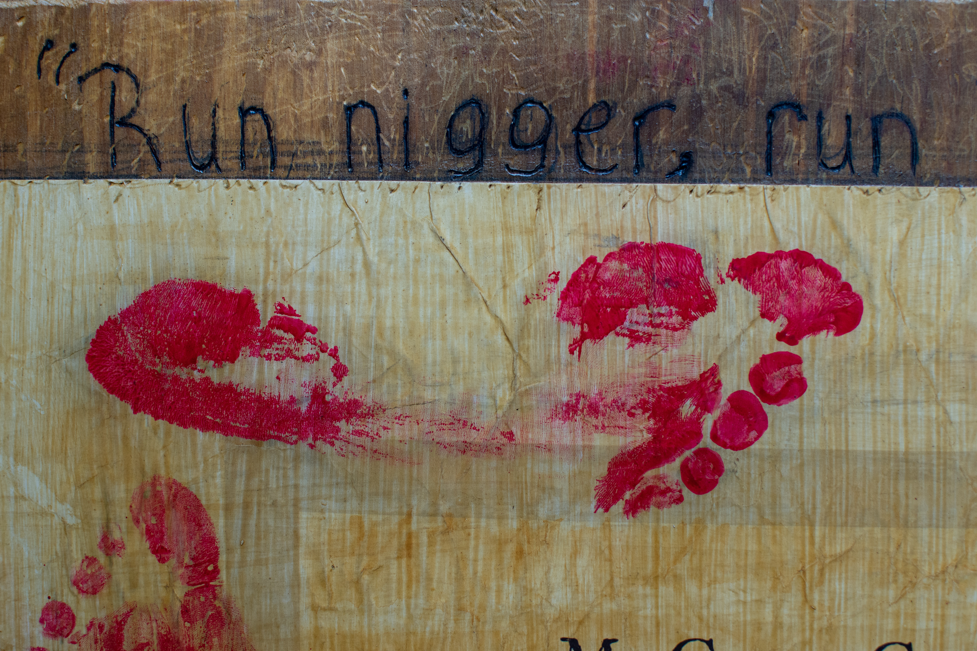 A close up: pyrography and footprints