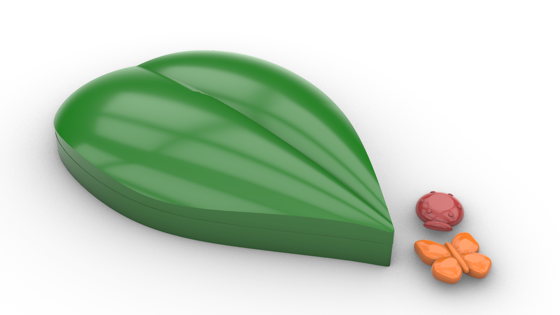 The Leaf boxed (closed) next to an example of each piece. Instead of X's and O's, I designed Butterflies and Beetles.