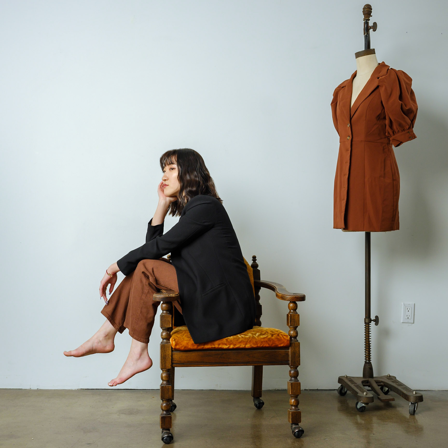 Ikeji Uju: Rae Wang exudes style in complementary blues and browns at a Los Angeles studio. Ikeji Uju Photography