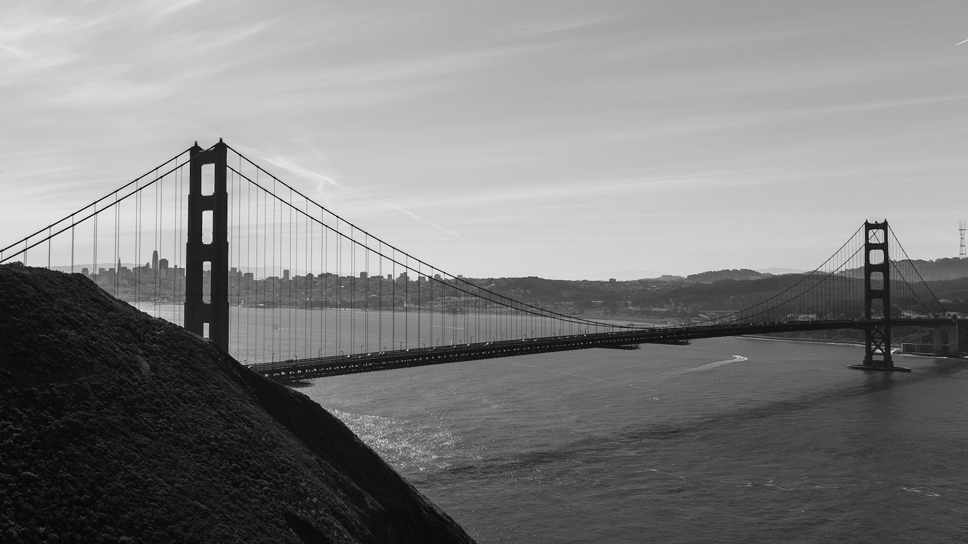 Captured by Ikeji Uju: Golden Gate Bridge and the San Francisco Bay during a clear Fall day. Shot in Black and White.