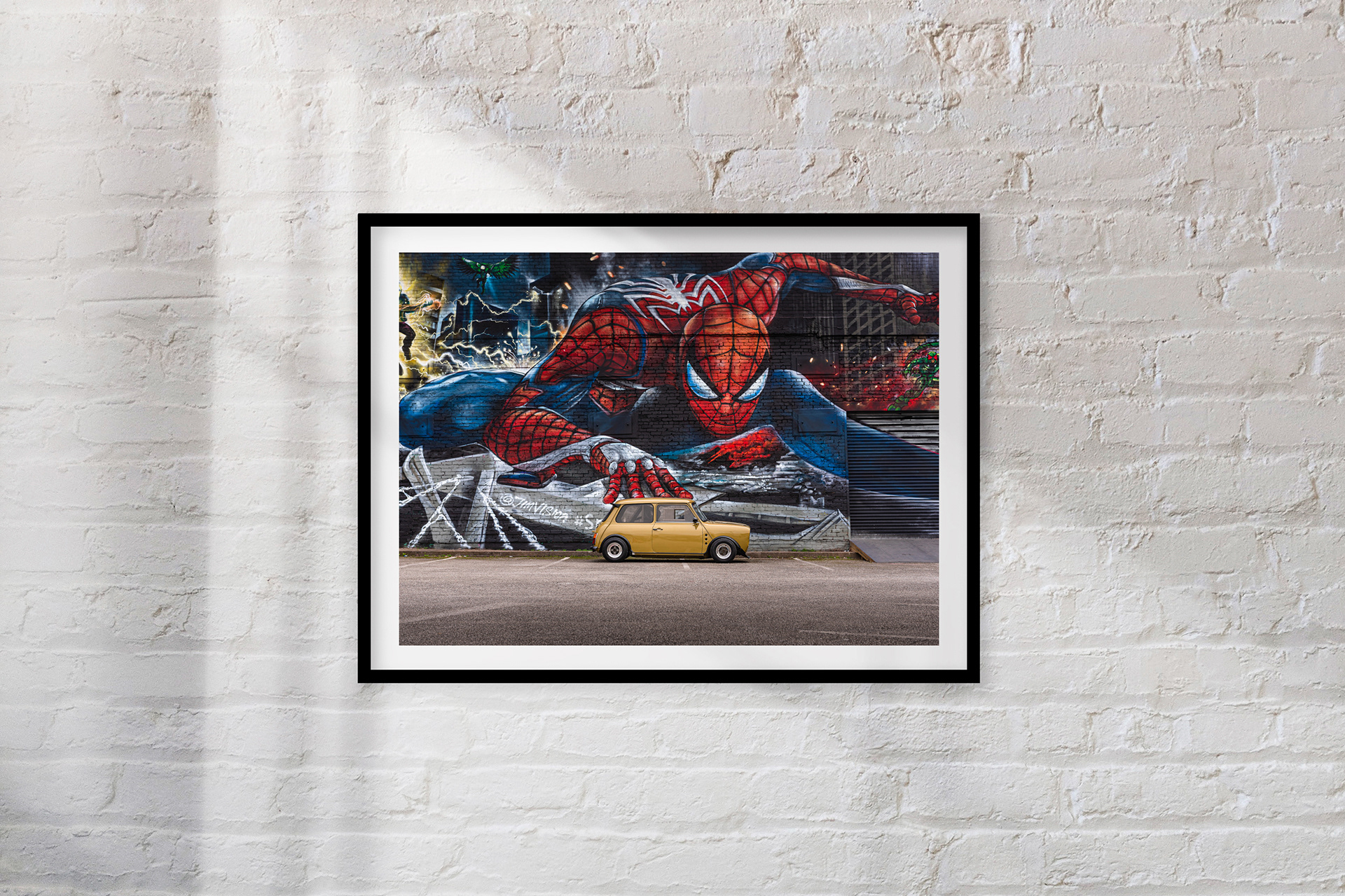 MINI MARVEL: Nick Shaw's awesome turbocharged classic Mini, which borrows styling and tuning cues from both British and JDM tuning culture, photographed in front of a well-placed mural in Birmingham, England.