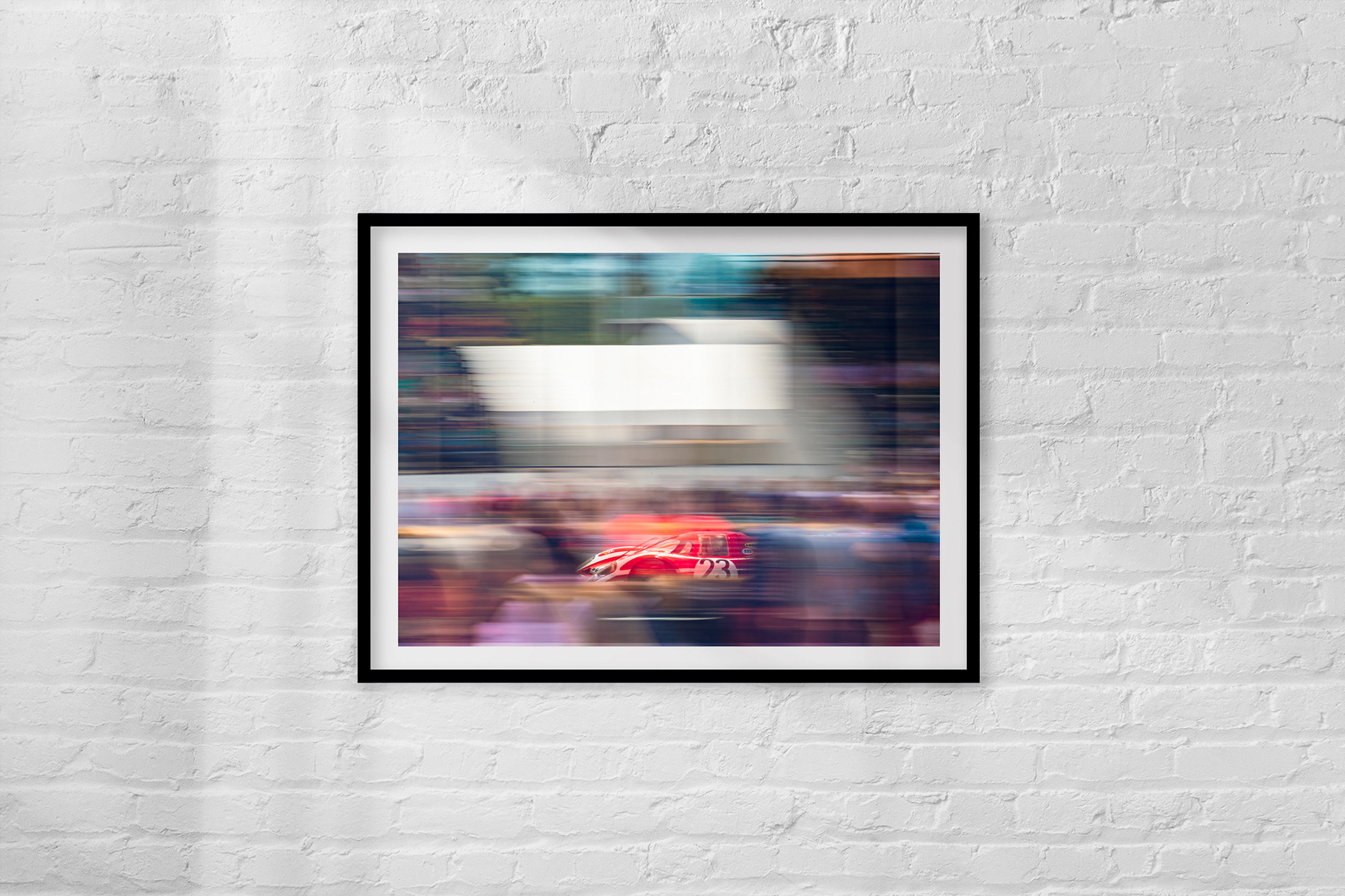 23: Arguably the most important 917 in history, the legendary Porsche 917-023 was driven by Hans Herrmann and Richard Attwood to victory at Le Mans in 1970. Here, it is captured passing through the colourful crowd at the 2019 Goodwood Festival of Speed.