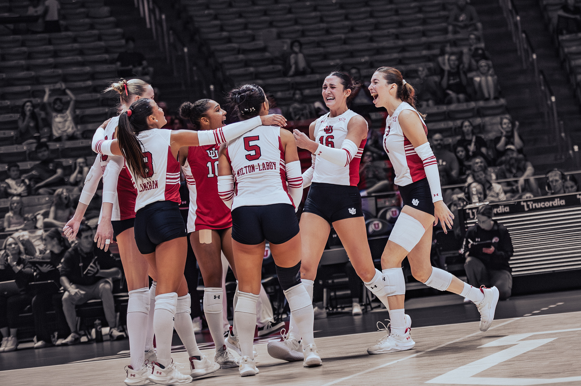 Full Team Celebration: Kamryn Gibaldo (#18), Iliana Linahan (#8), Levani Key-Powell (#10), Leah Wilton-Laboy (#5), Devyn Wiest (#16), and Lana Mijacic (#1)