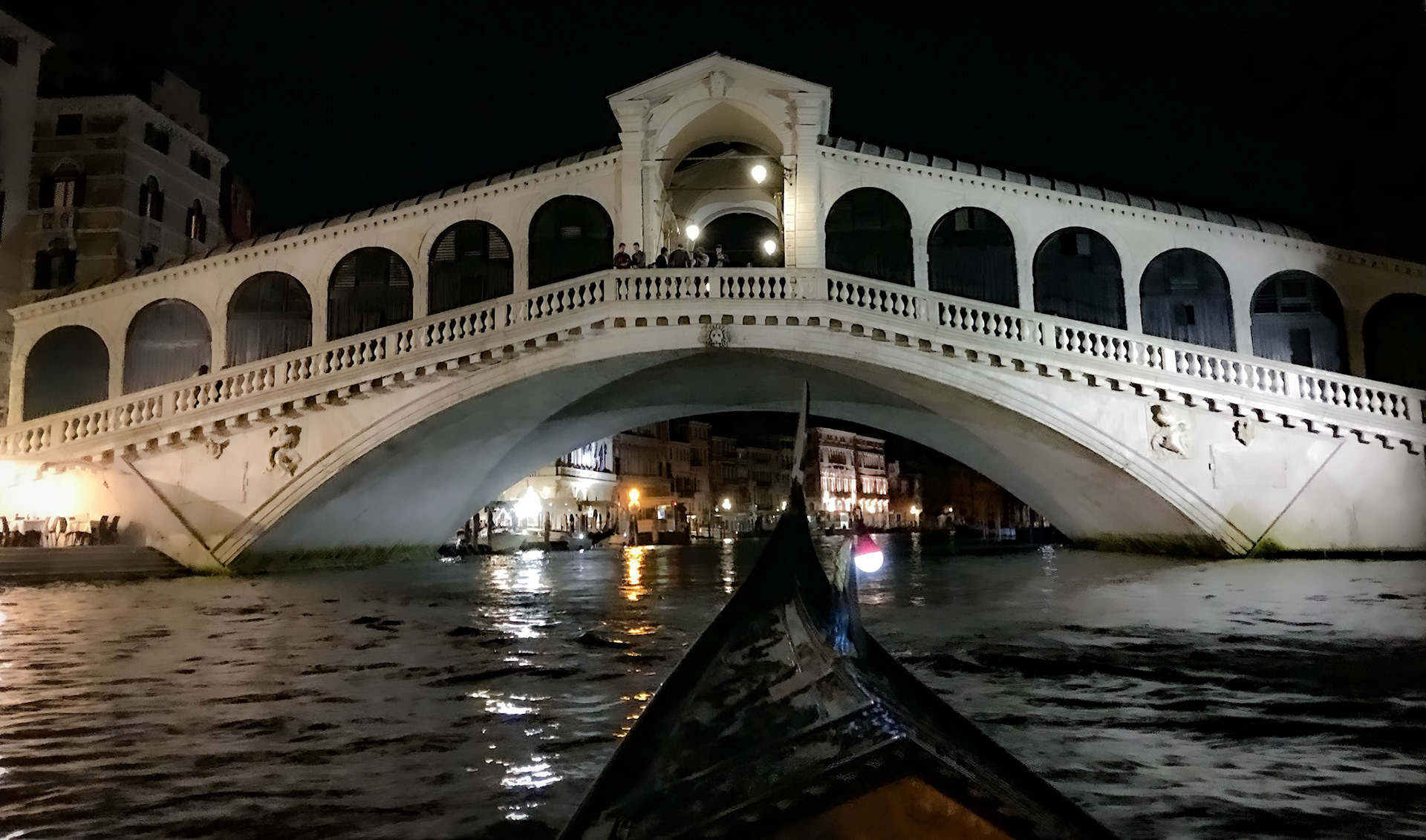 Wonderful nighttime gondola ride in Venice, Italy.