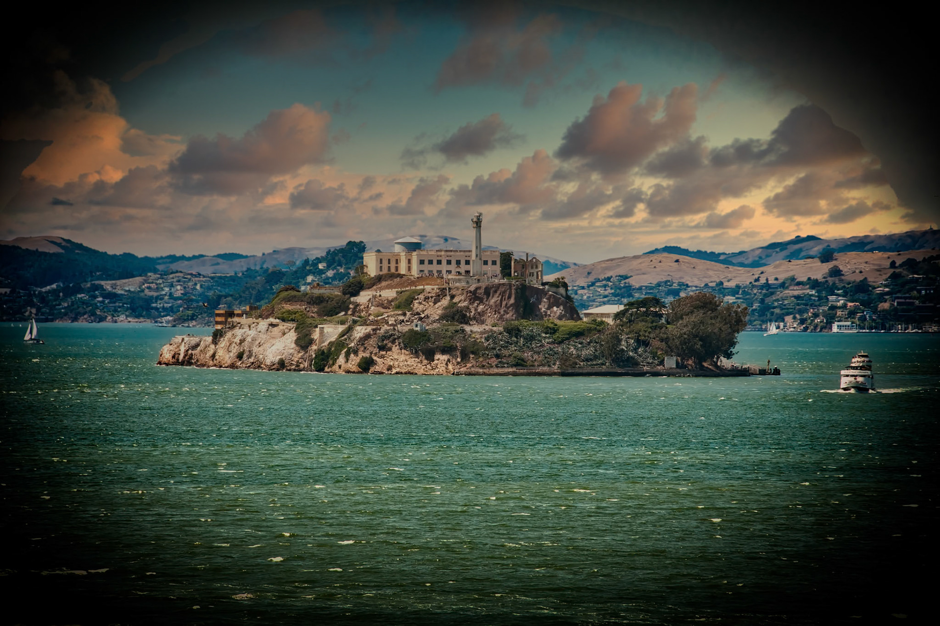 Looking at the world famous Alcatraz Island through one of those 25 cent telescopes typically found on a pier (telescope simulated).