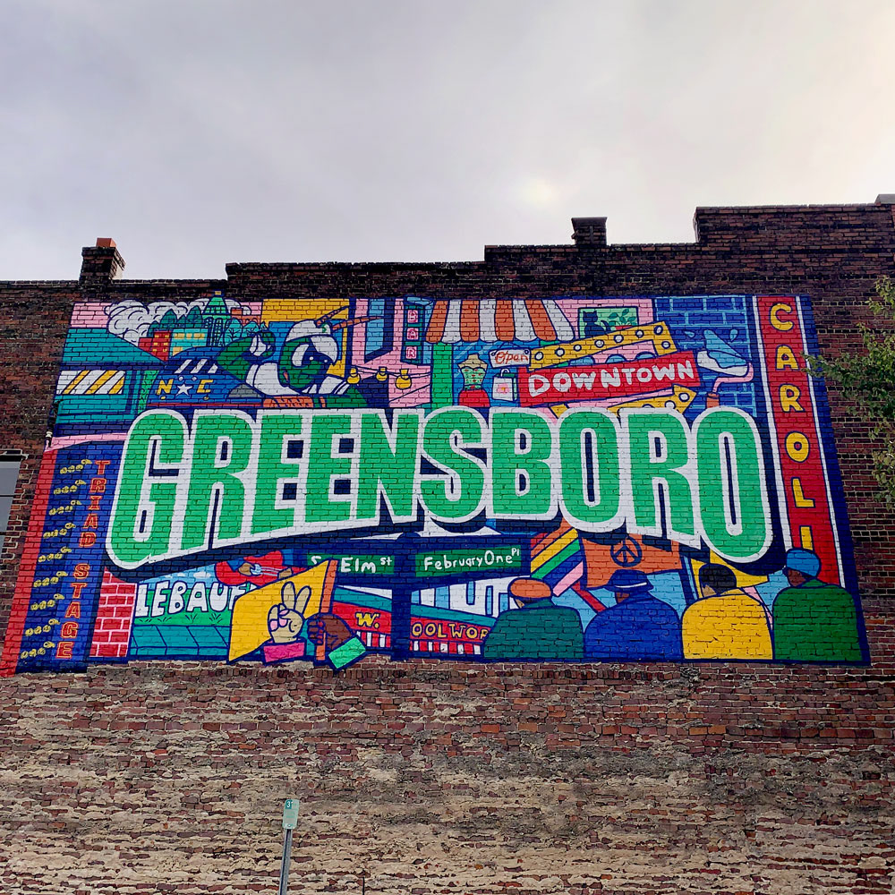 Art on the charming Main Street in Downtown Greensboro, NC.
