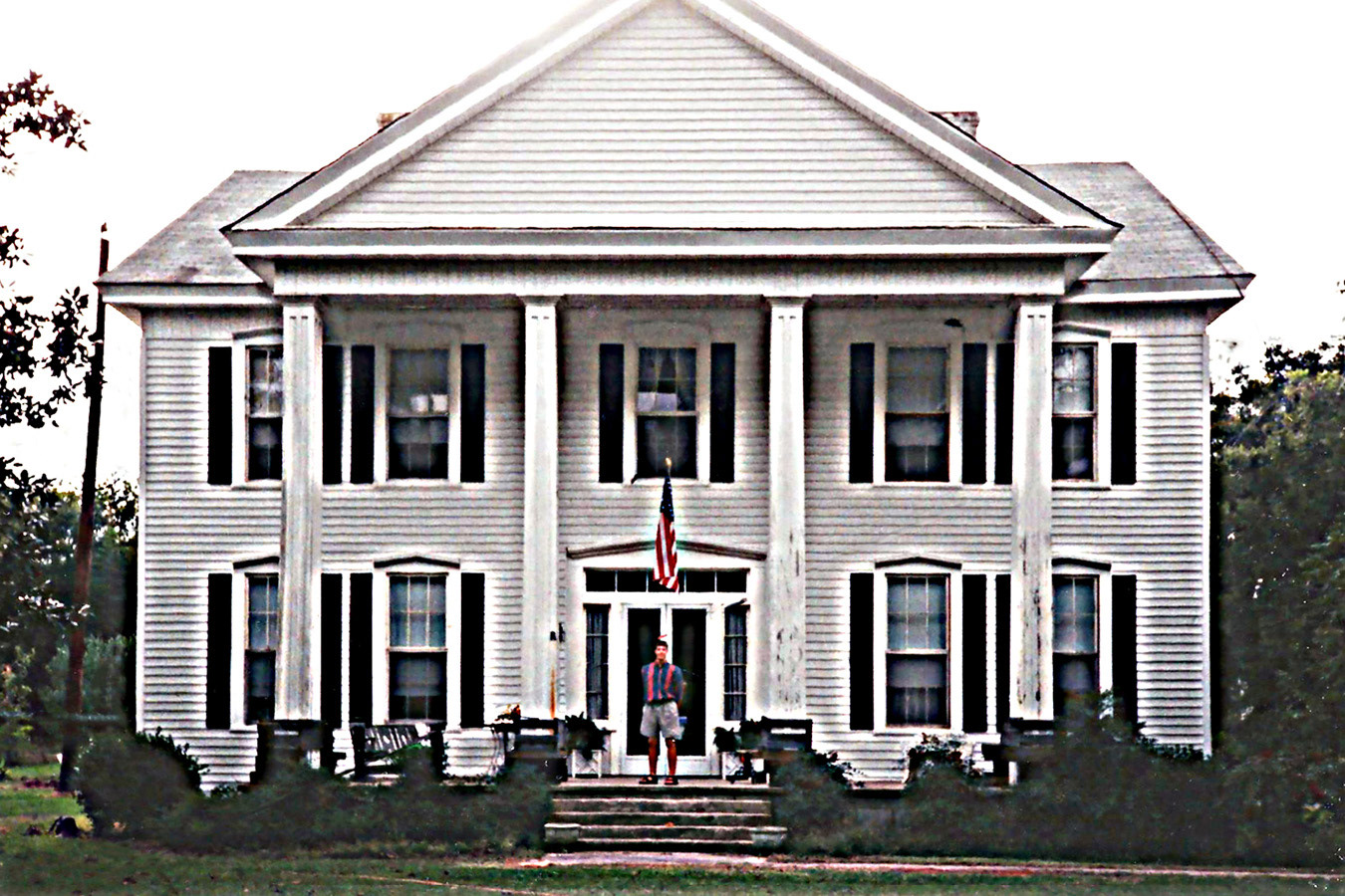 Clowney visited his great-grandfather’s childhood home, an imposing Greek Revival house from the 1870s, during a family reunion in 1995. Photographer Once Known, Courtesy of Clowney Family Archives
