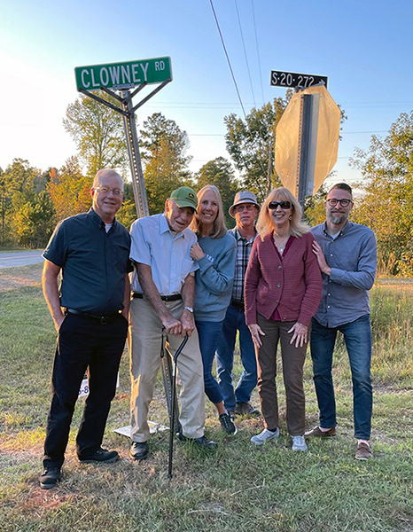 Clowney, pictured with family at the Clowney Road sign in Blair, South Carolina. Photo by Sammy Clowney