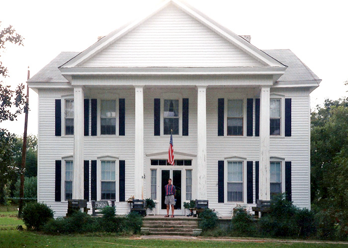 Clowney visited his great-grandfather’s childhood home, an imposing Greek Revival house from the 1870s, during a family reunion in 1995. Photographer Once Known, Courtesy of Clowney Family Archives