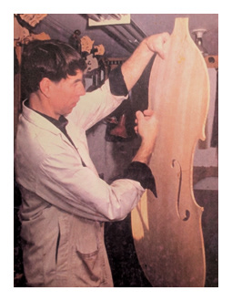 Working on a double bass front circa 1980