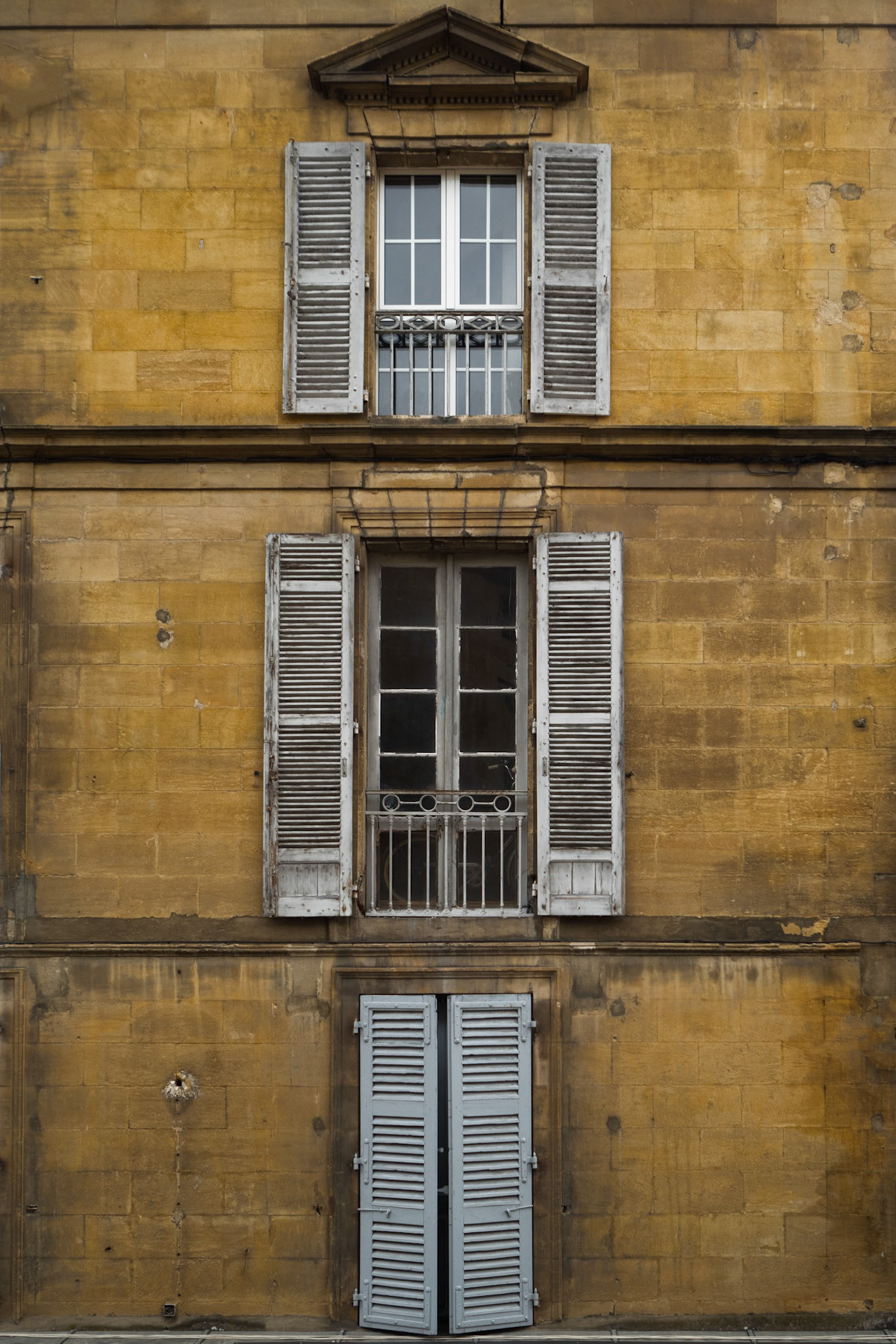 Windows and shutters in Sarlat, Dordogne, France.