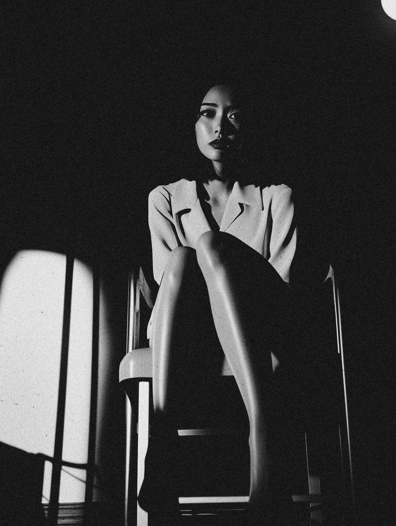cinematic stil, body shotoff a 33 year old Japanese woman, fuji acros film sim, sitting on a chair and showing of her long legs, and flirting with the camera, fear in her eyes --ar 3:4 --quality 2 --style raw --profile 3meuale --v 6.1 Job ID: d2a204d9-f633-4287-ac06-2d1261afcca5