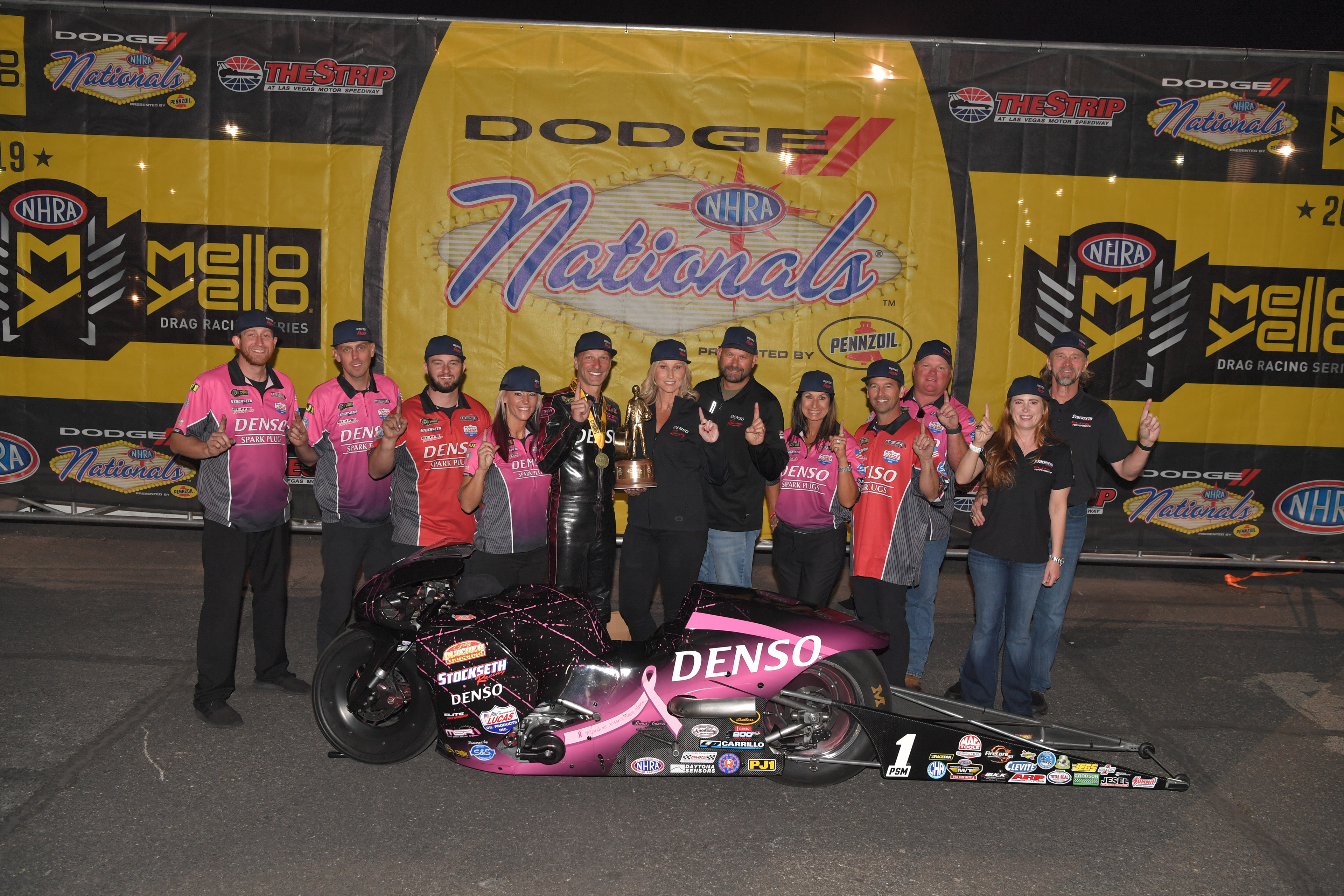In the middle is DENSO's Lisa Michler celebrating with the whole MSR team.