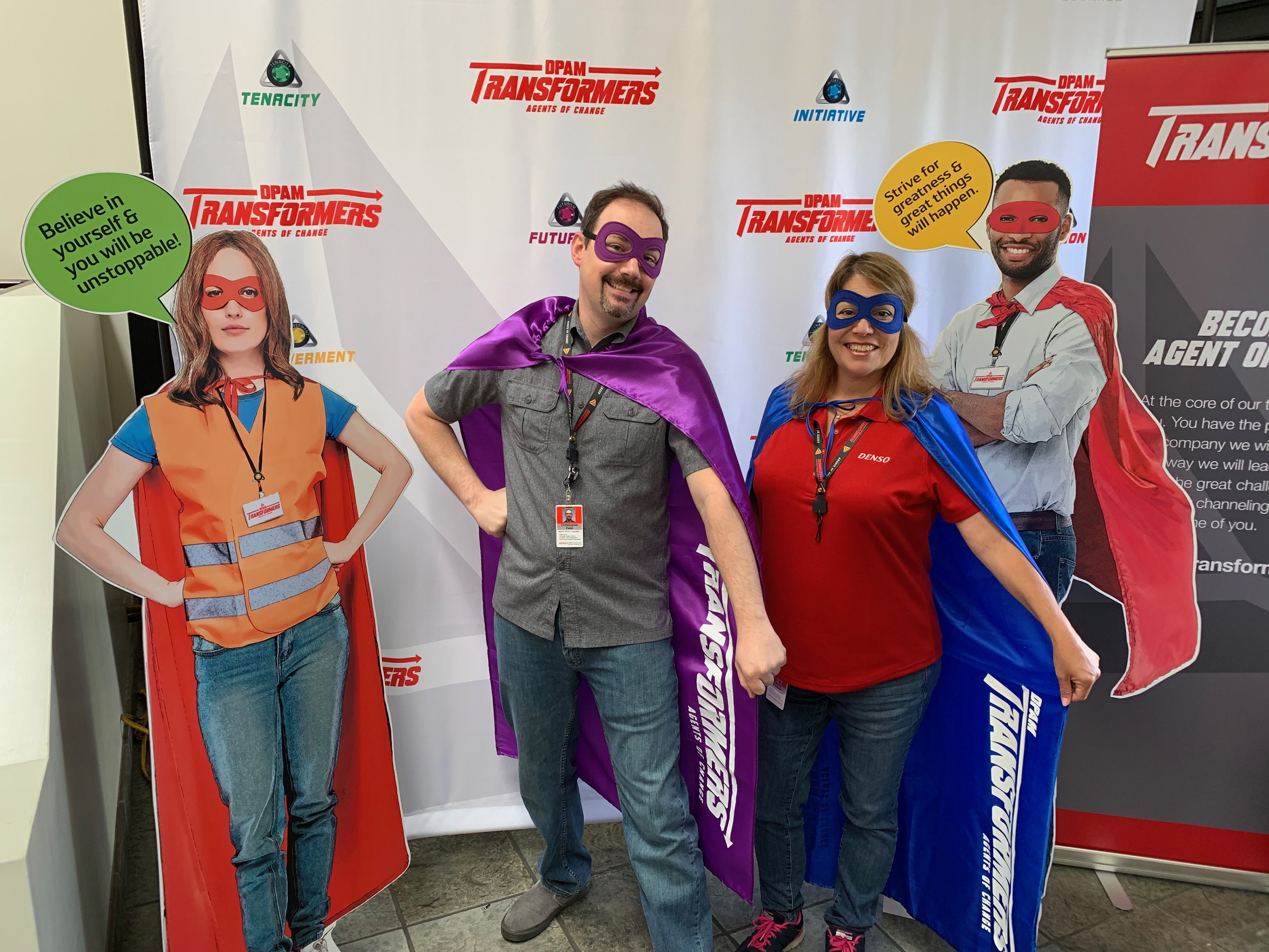 Every month associates who earned crystals posed for a photo with cutouts against a custom backdrop.