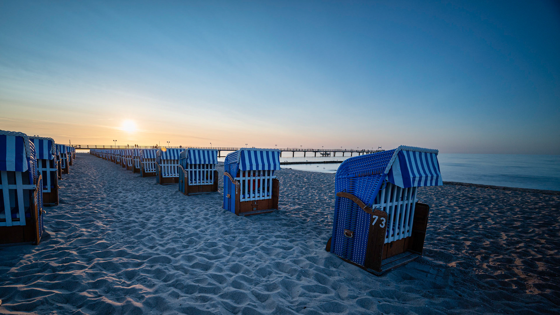 Beach chair and sun set