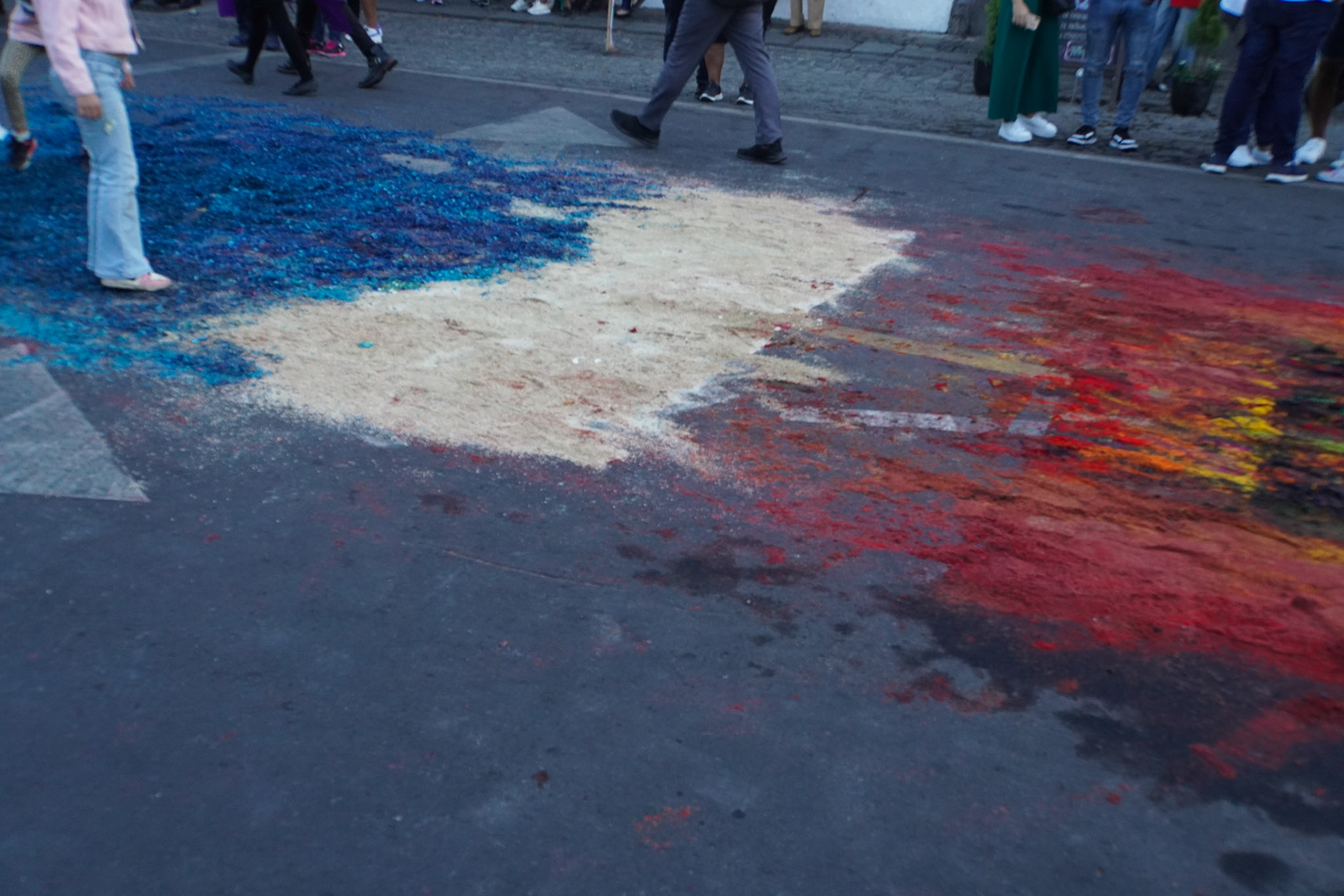Alfombras are walked over by the procession