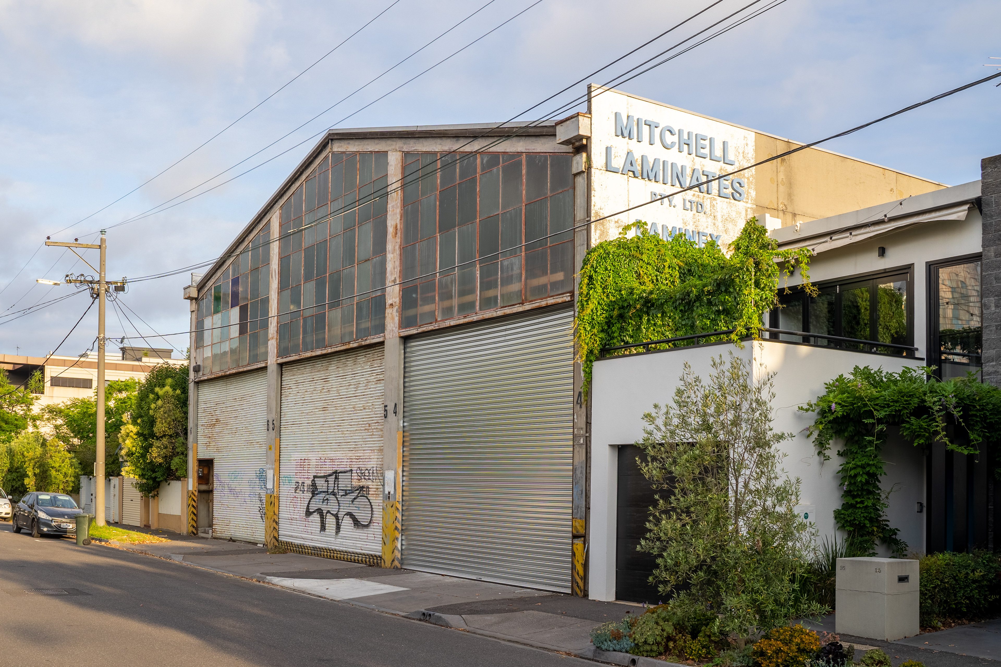 Street view of an industrial building and roller door
