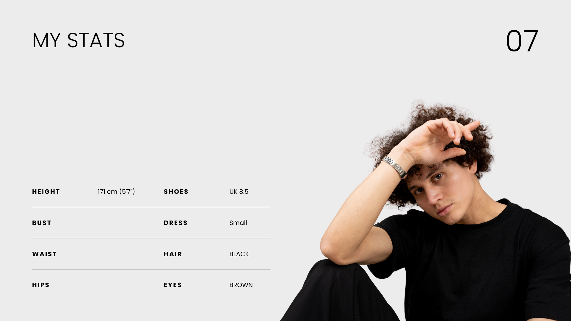 James Tapiero model profile with a seated portrait and a table of modelling measurements