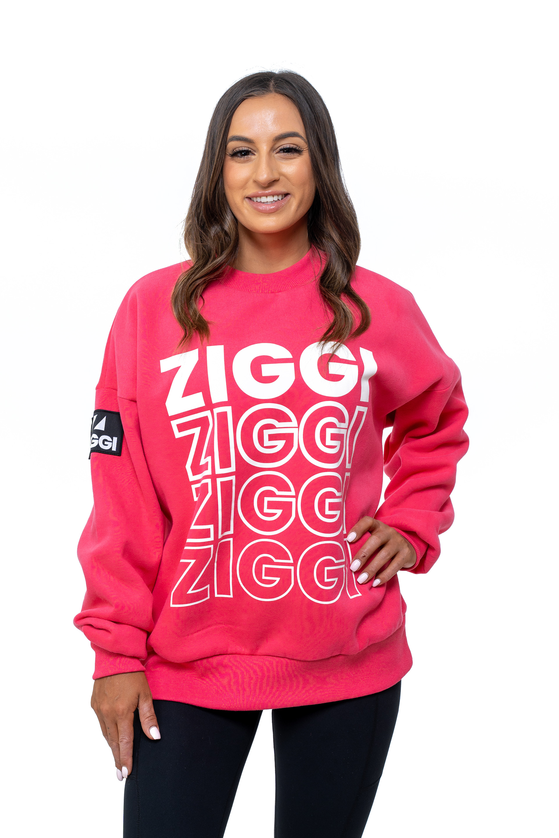 Studio portrait wearing a pink ZIGGI T-shirt