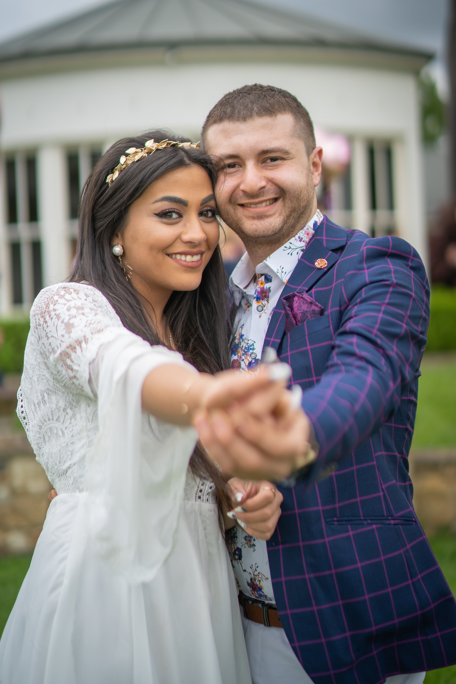 Wedding couple smiling together outdoors