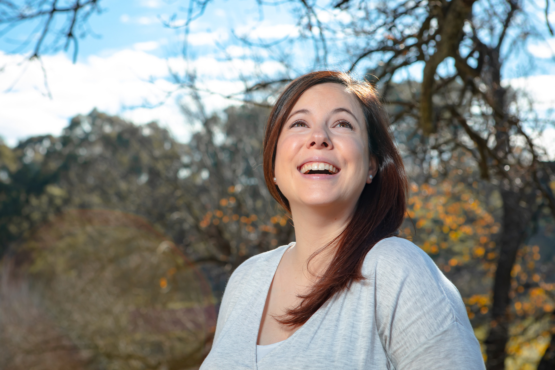 Close-up maternity portrait in soft outdoor light