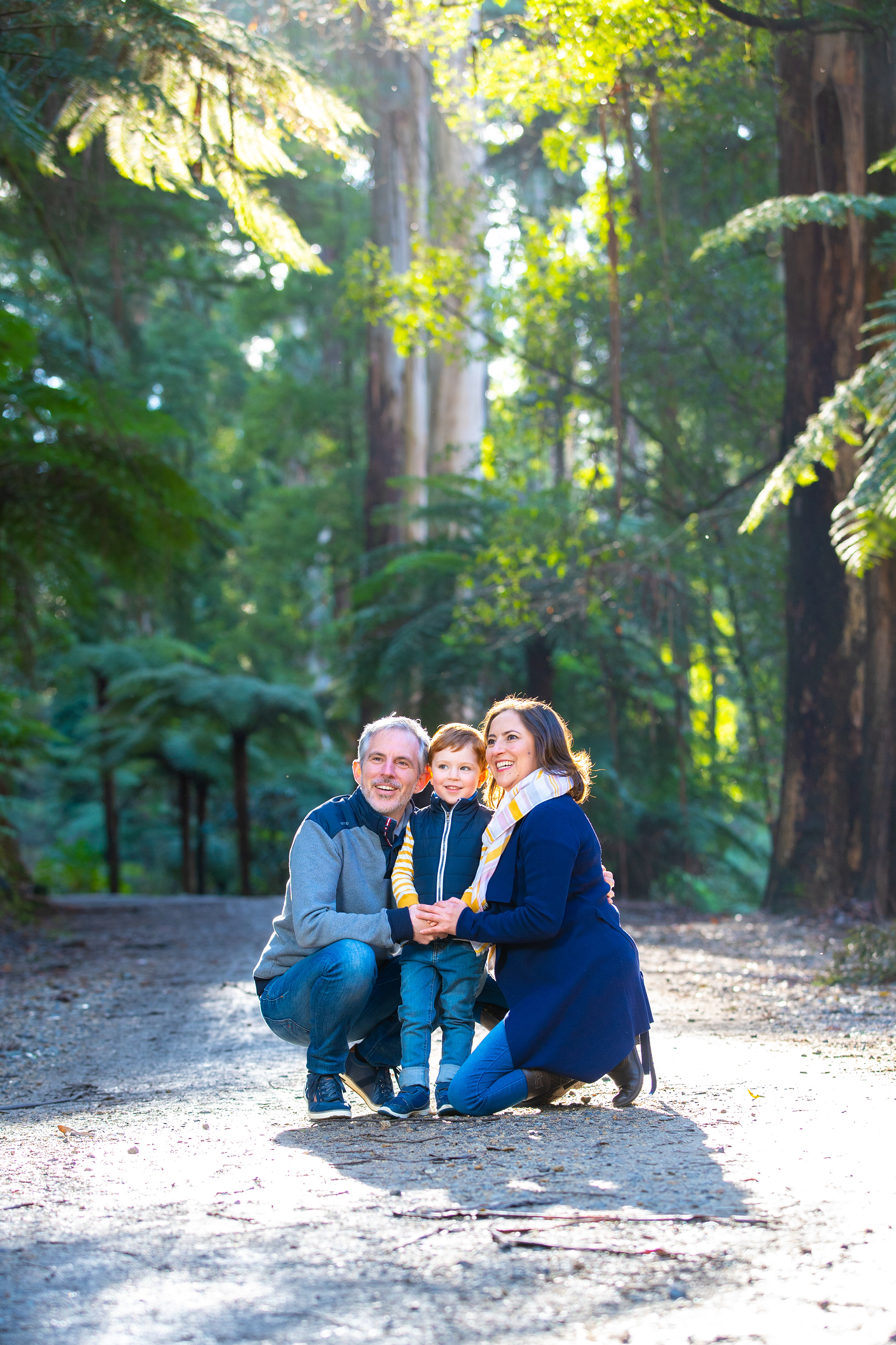 Portrait surrounded by lush greenery