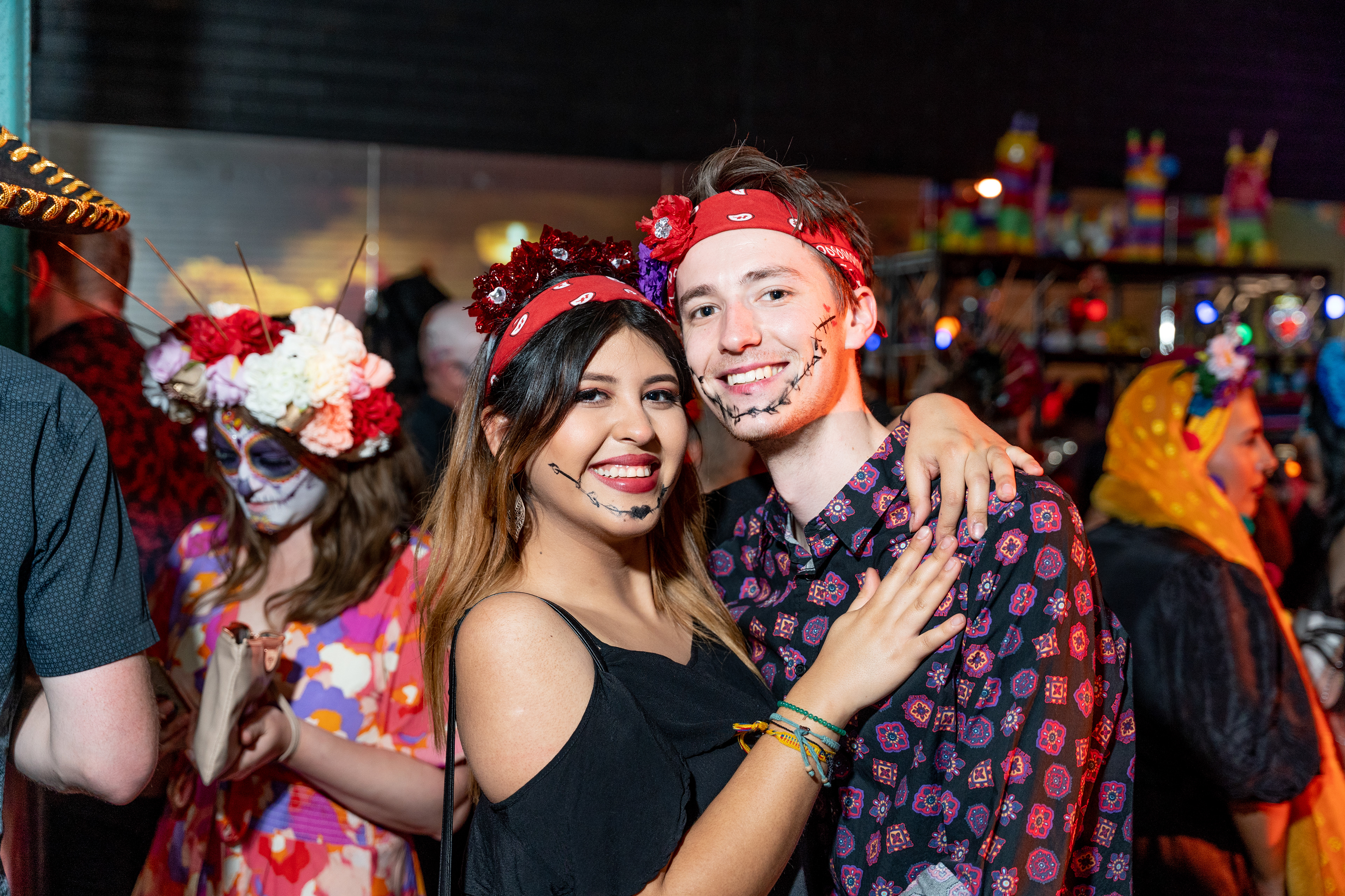 Guests embracing during a festive cultural event