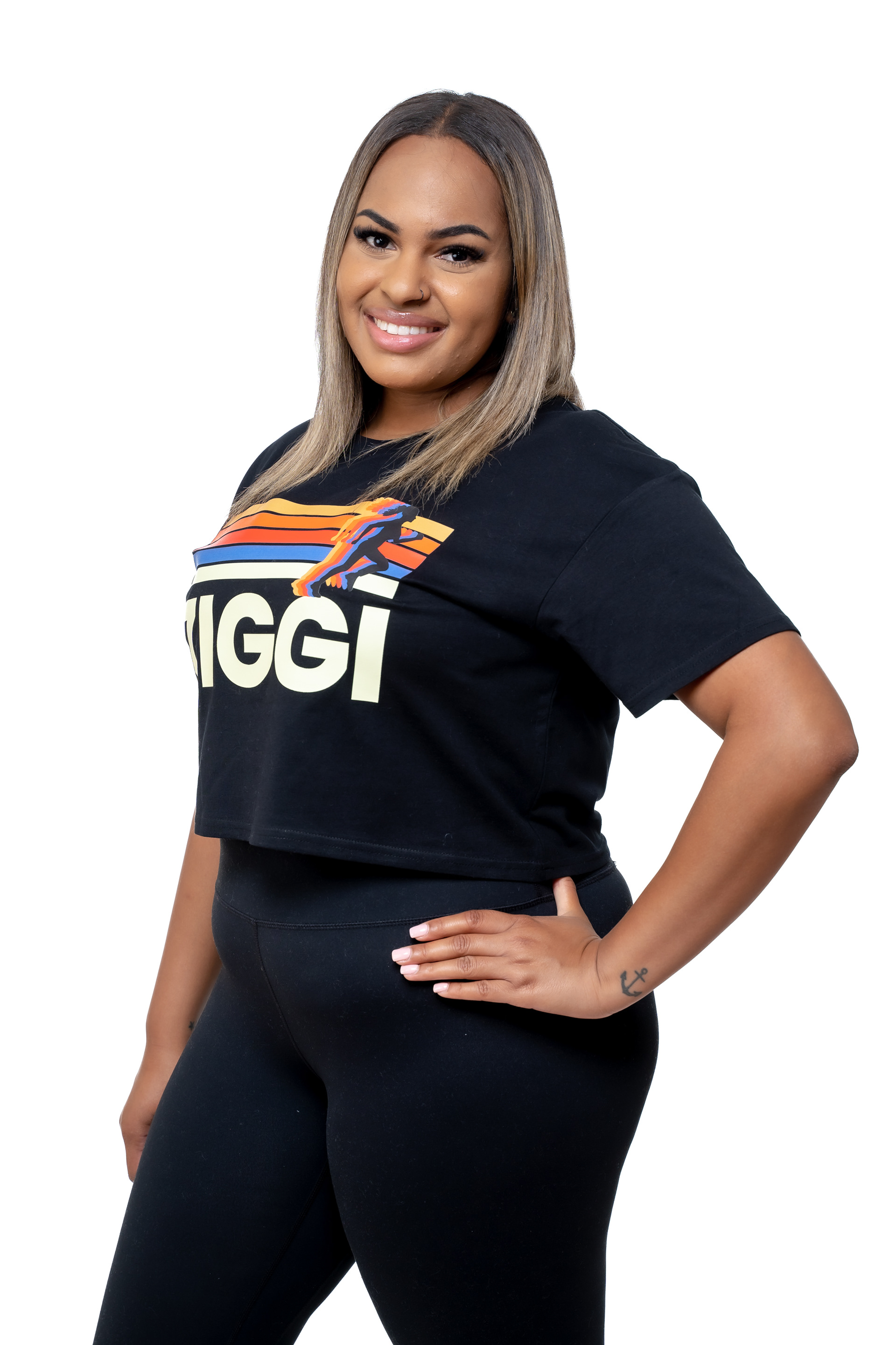 Studio portrait wearing a black ZIGGI T-shirt